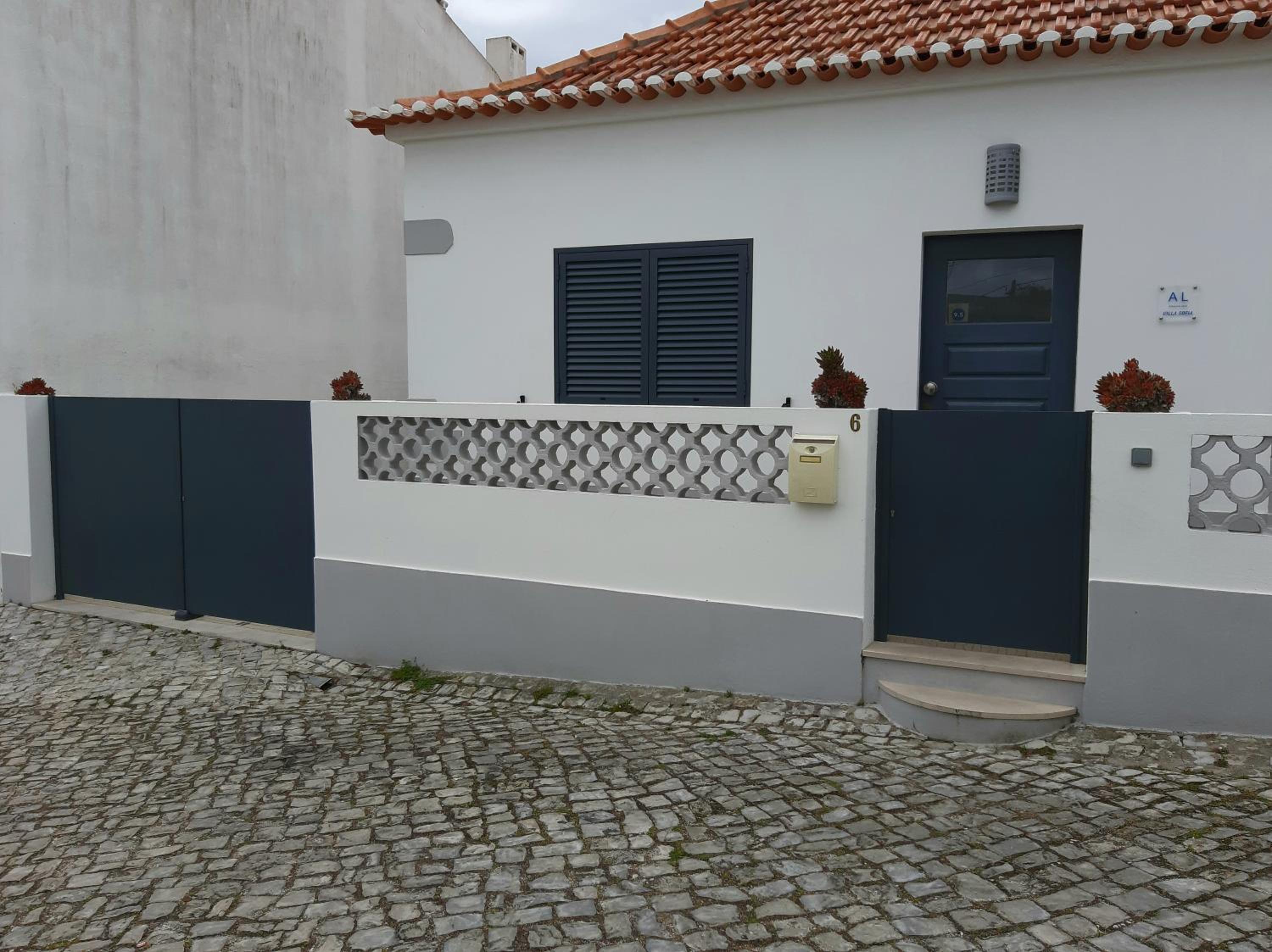Three-Bedroom House - Photo 22