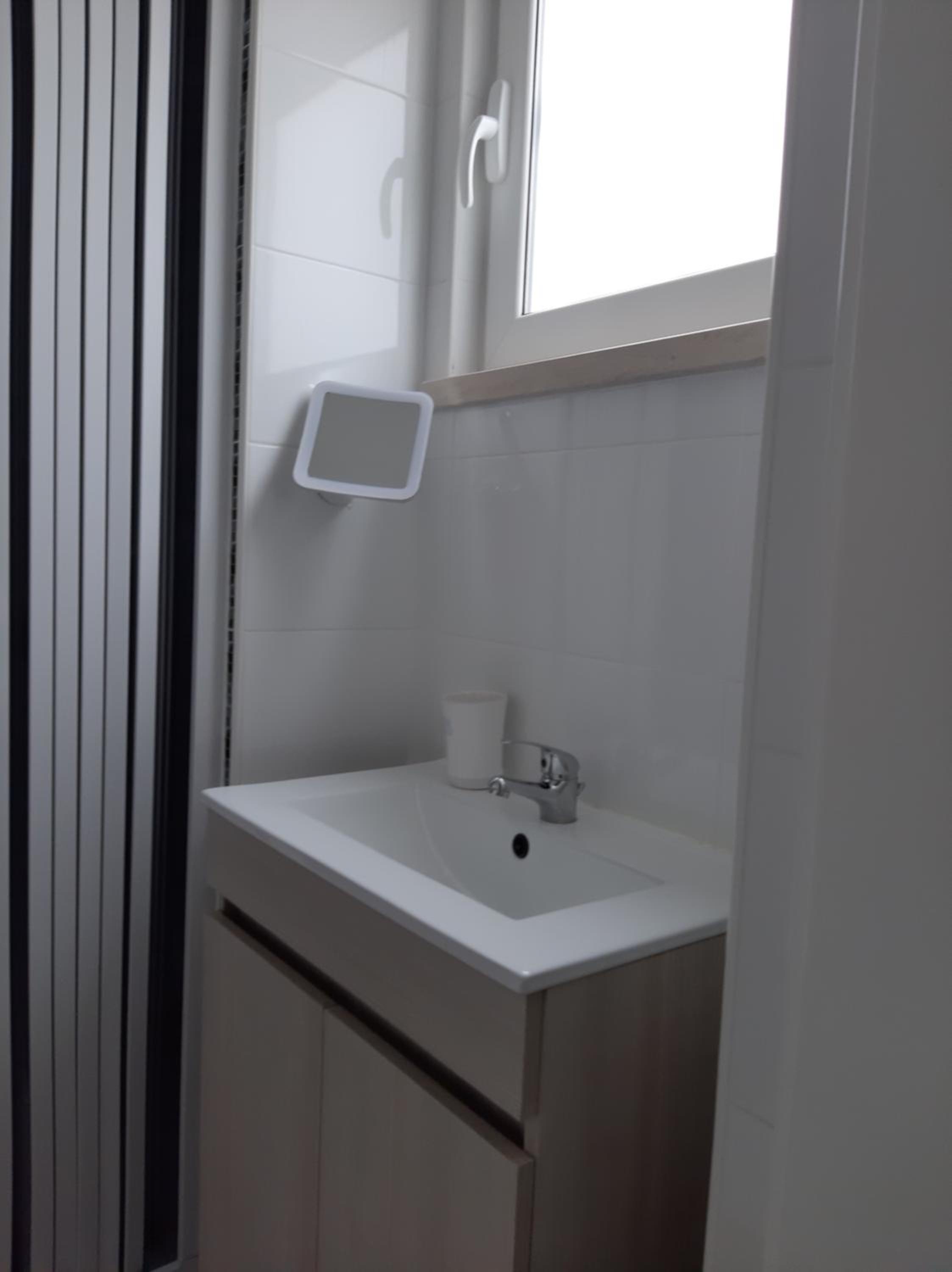 Three-Bedroom House - Photo 15
