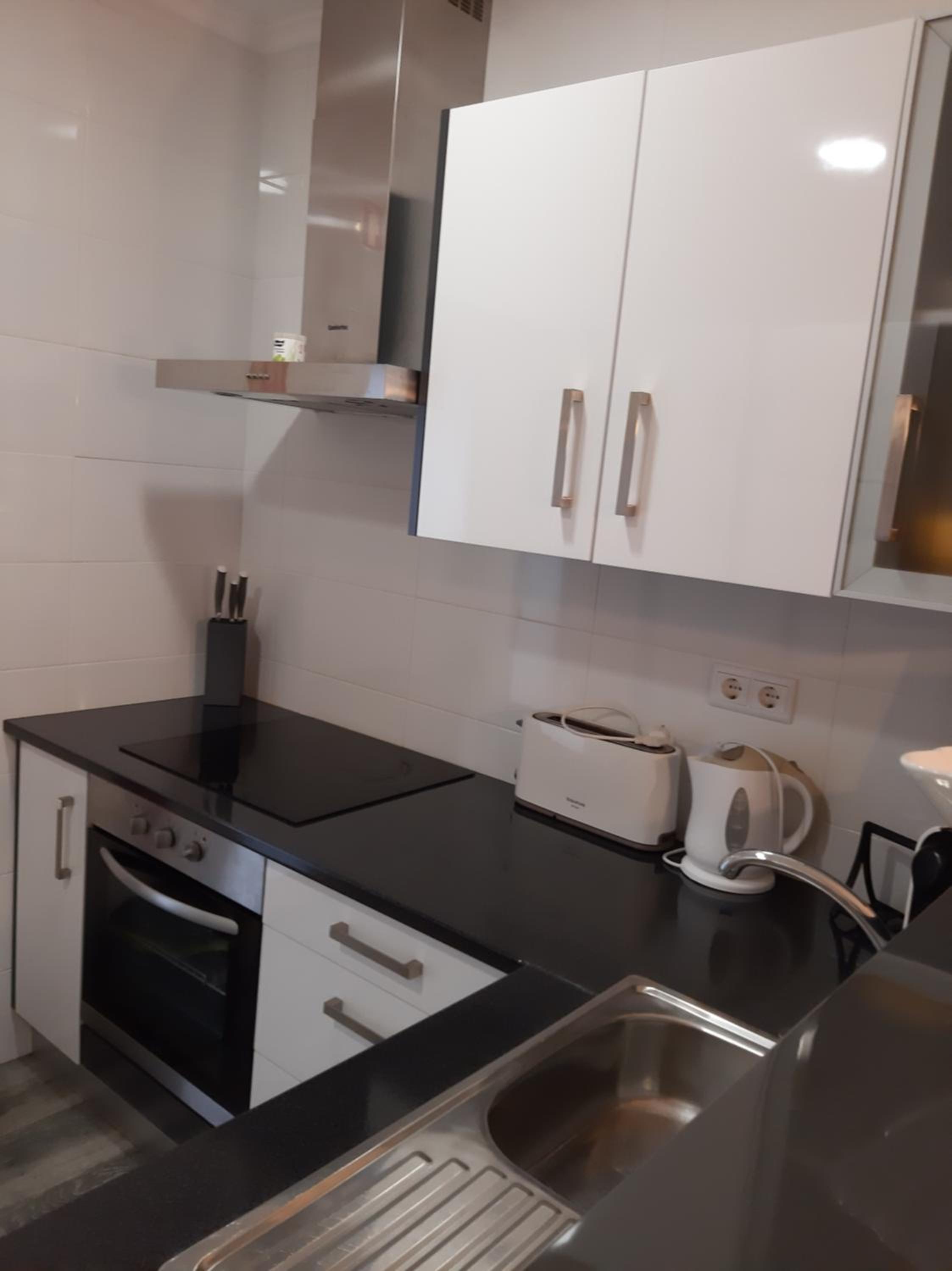 Three-Bedroom House - Photo 16