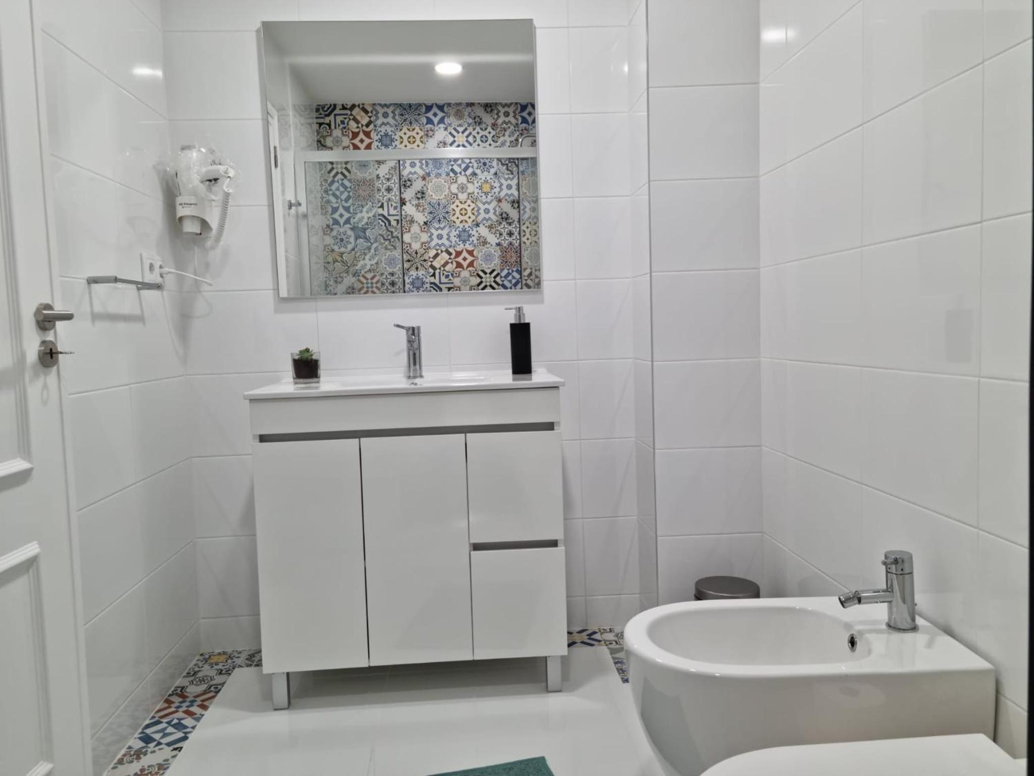 Three-Bedroom Apartment - Photo 14