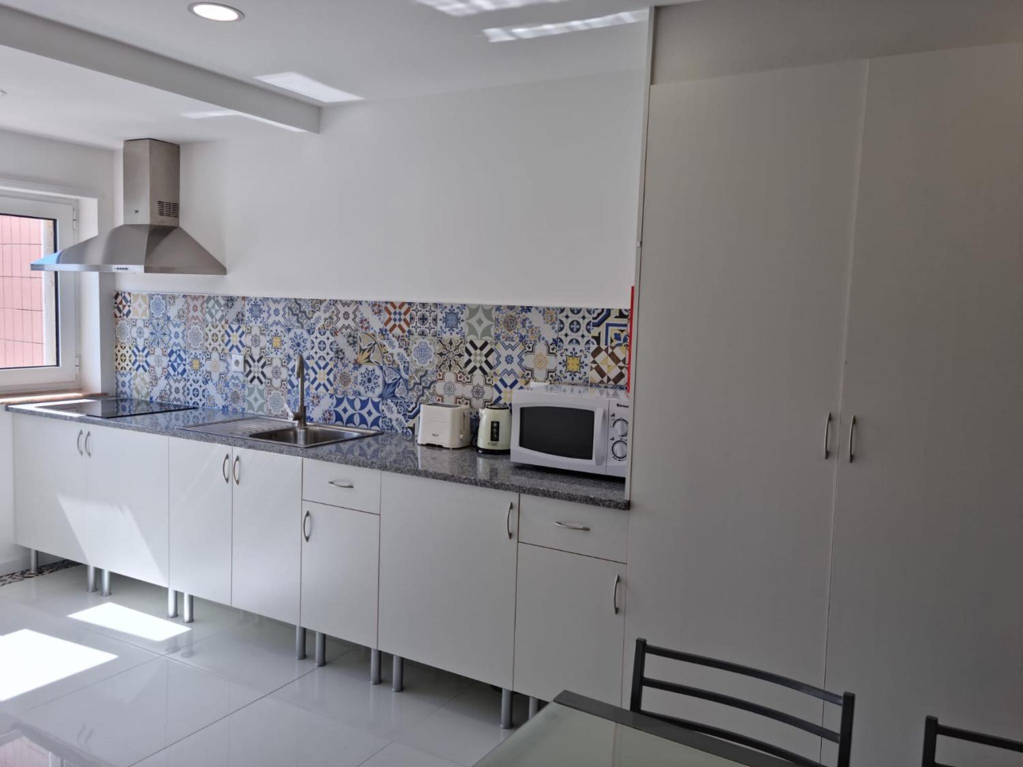 Three-Bedroom Apartment - Photo 16