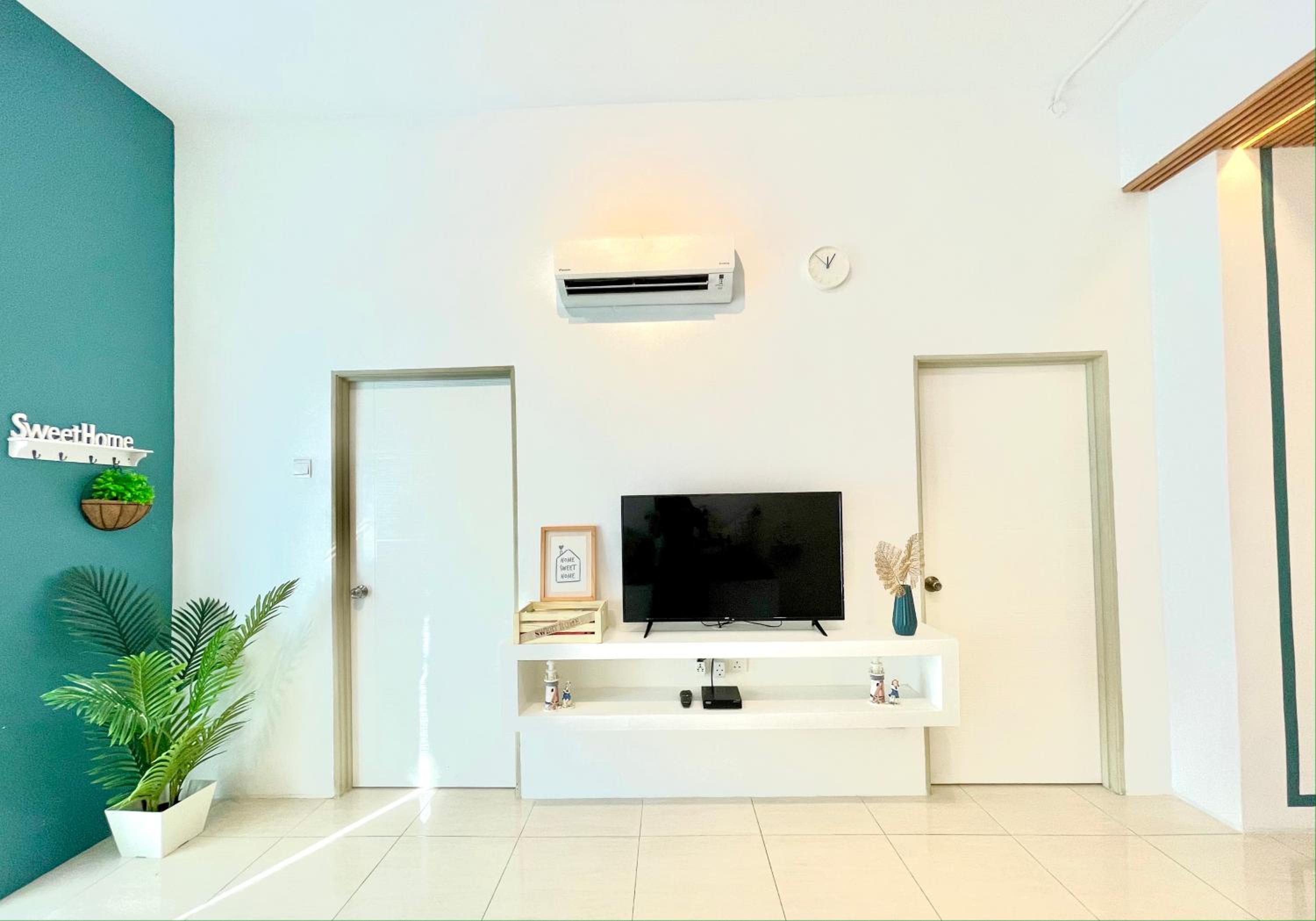 Three-Bedroom Apartment - Photo 26