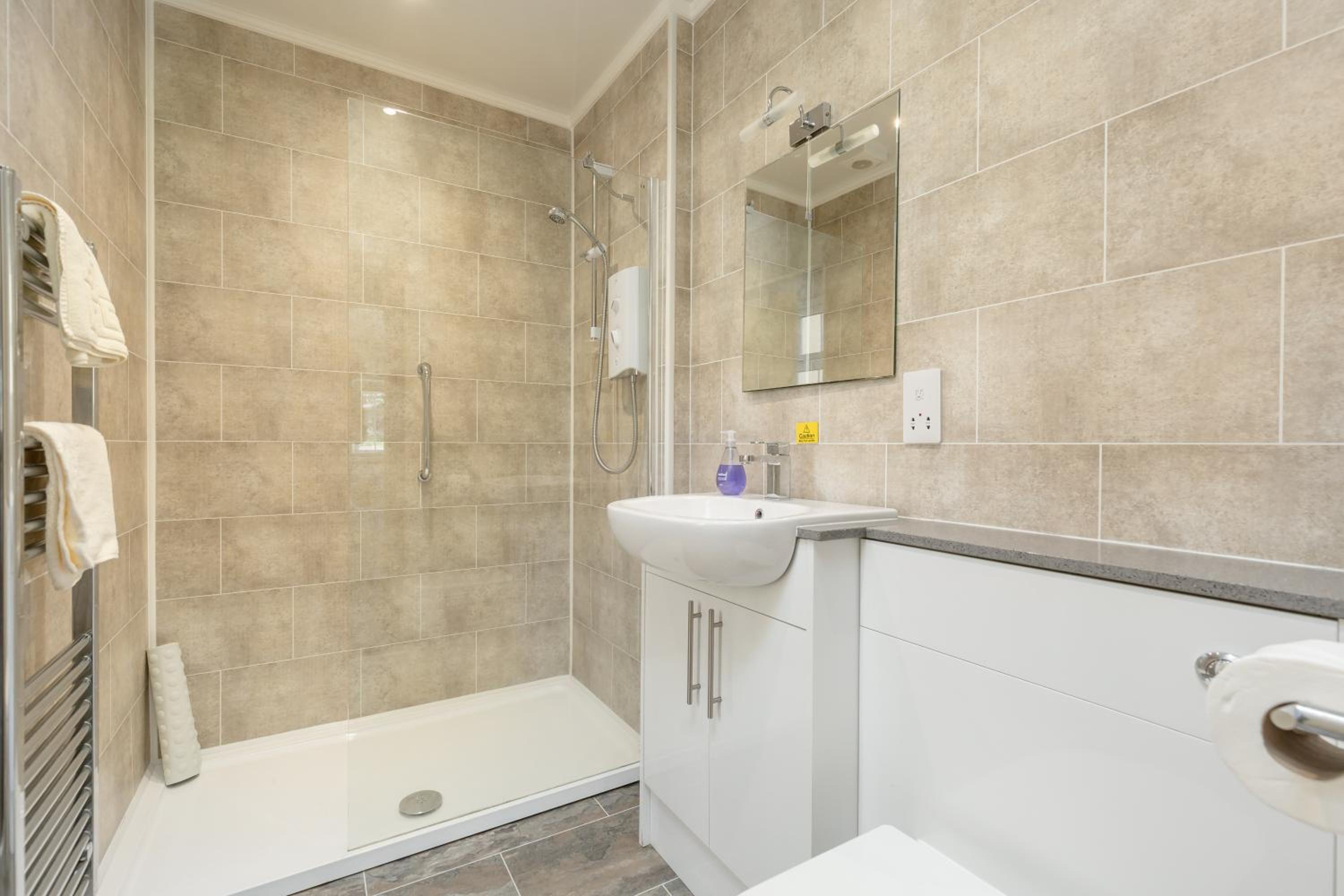 Three-Bedroom House - Photo 4
