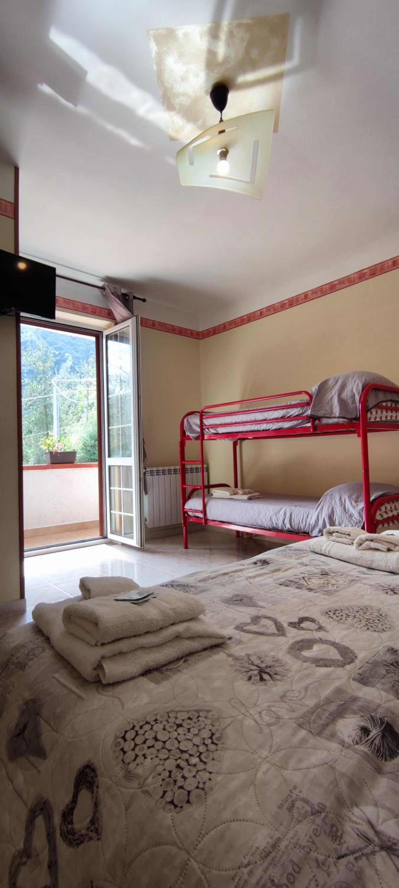 Quadruple Room with Balcony - Photo 1
