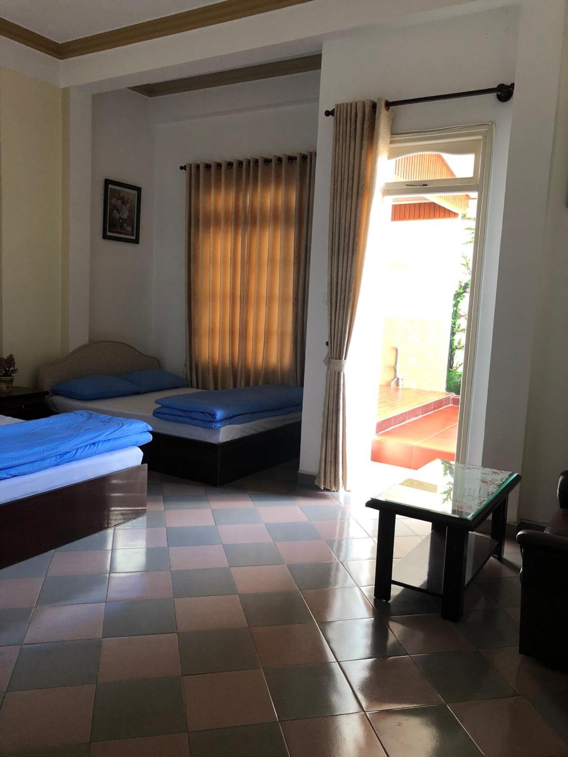 Quadruple Room with Private Bathroom