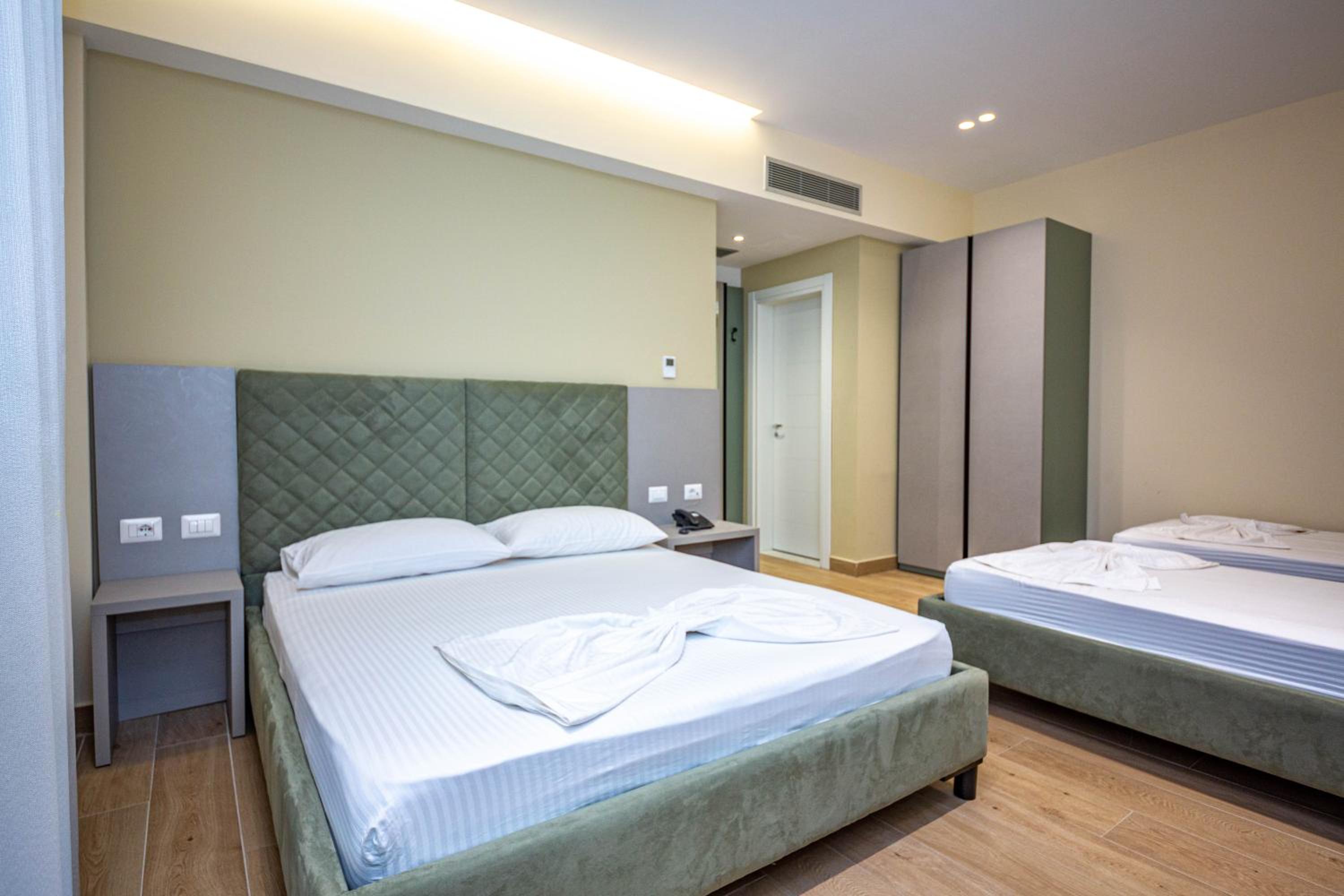 Quadruple Room with Balcony and Side Sea View photo 1