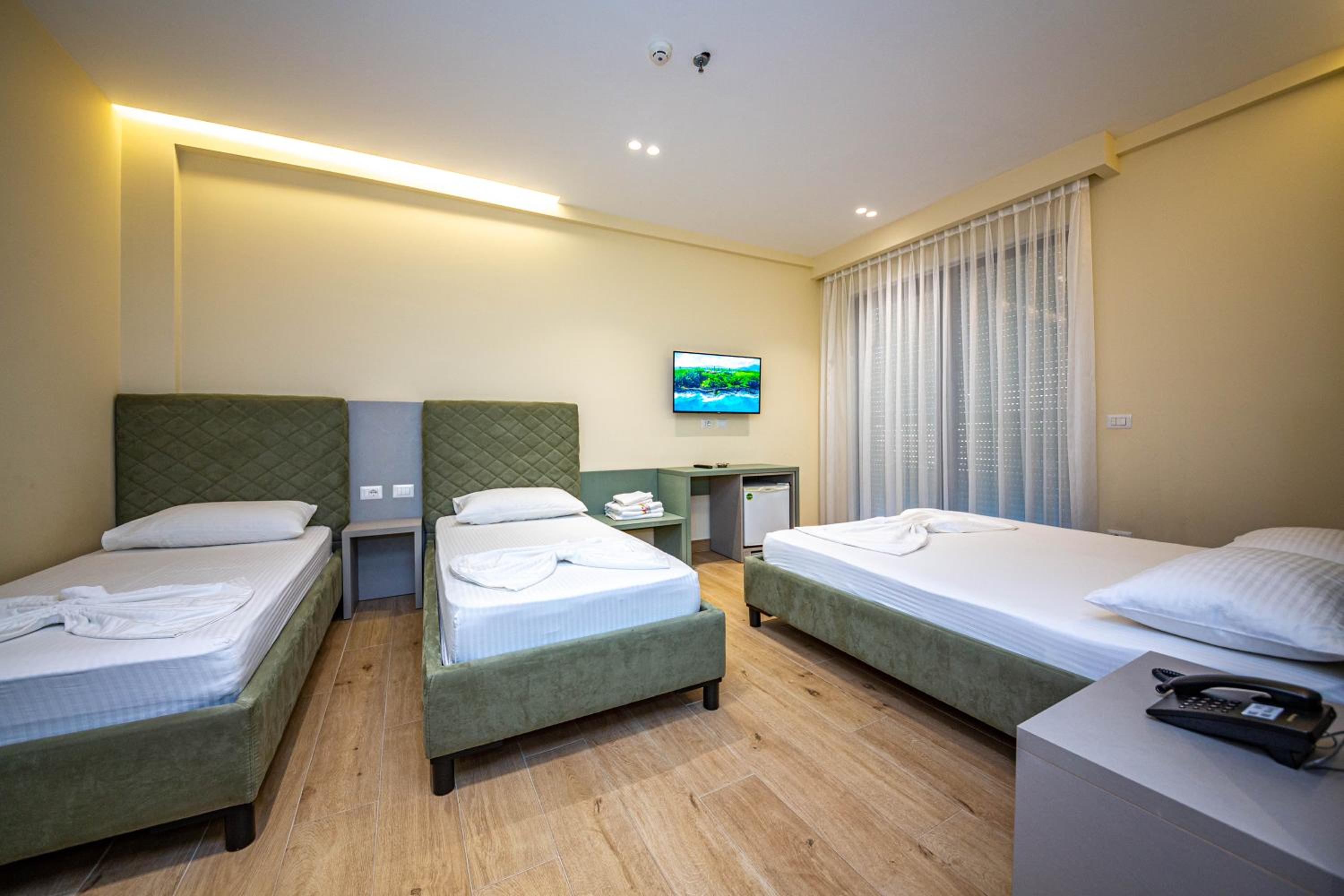Quadruple Room with Balcony and Side Sea View