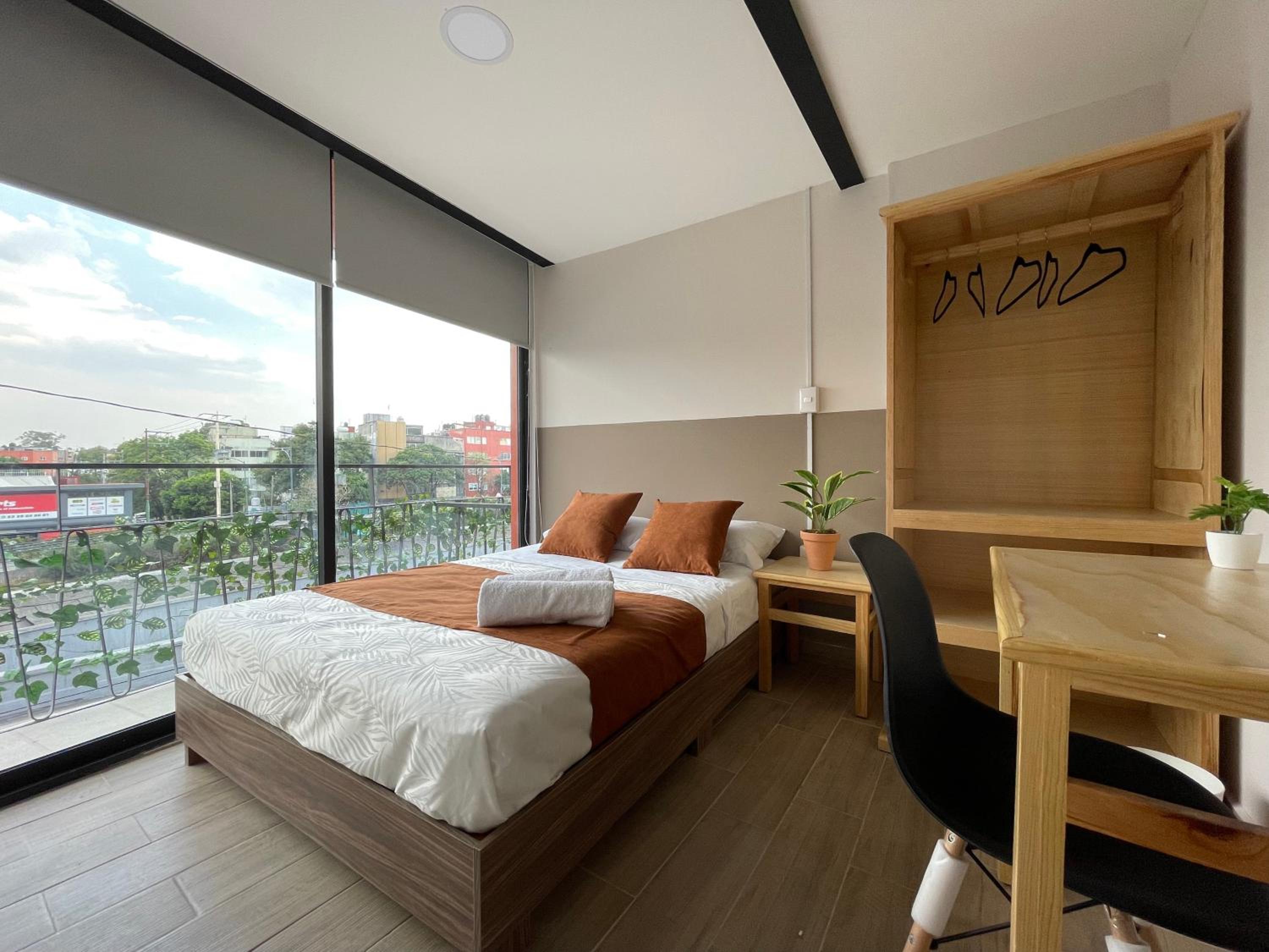 Deluxe Double Room with Balcony - Photo 1