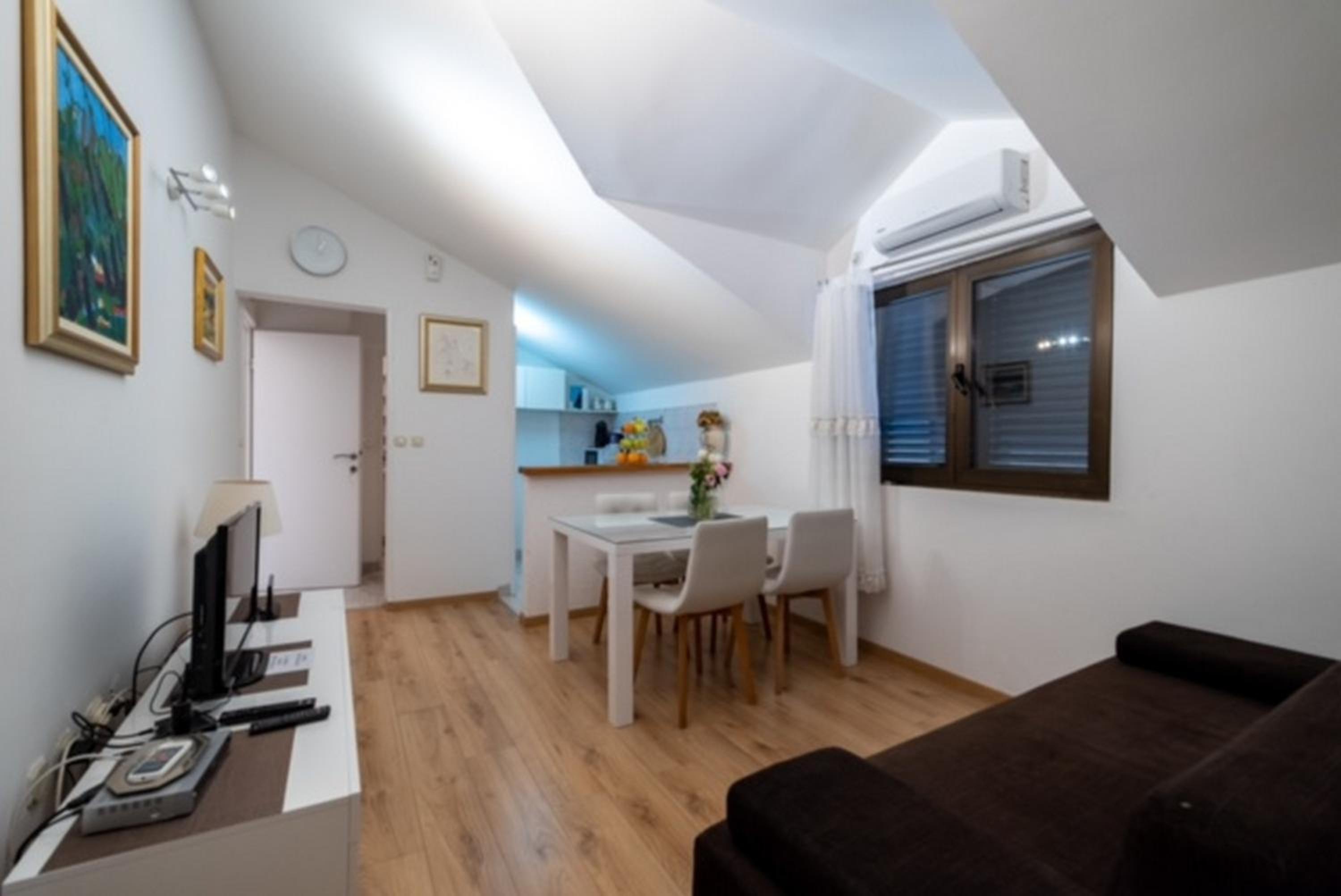 One-Bedroom Apartment with Patio and Sea View