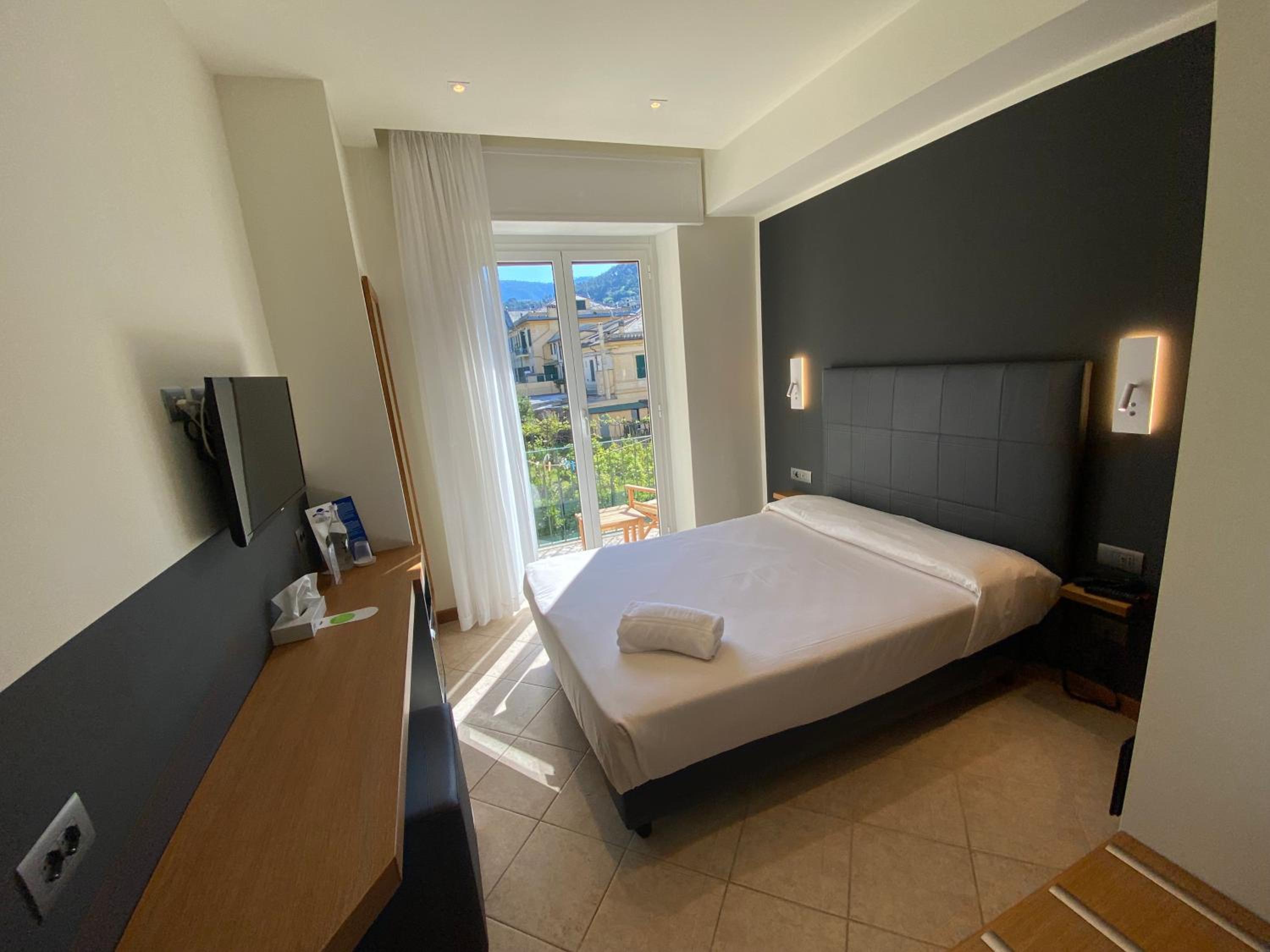 Quarto Individual com Varanda
