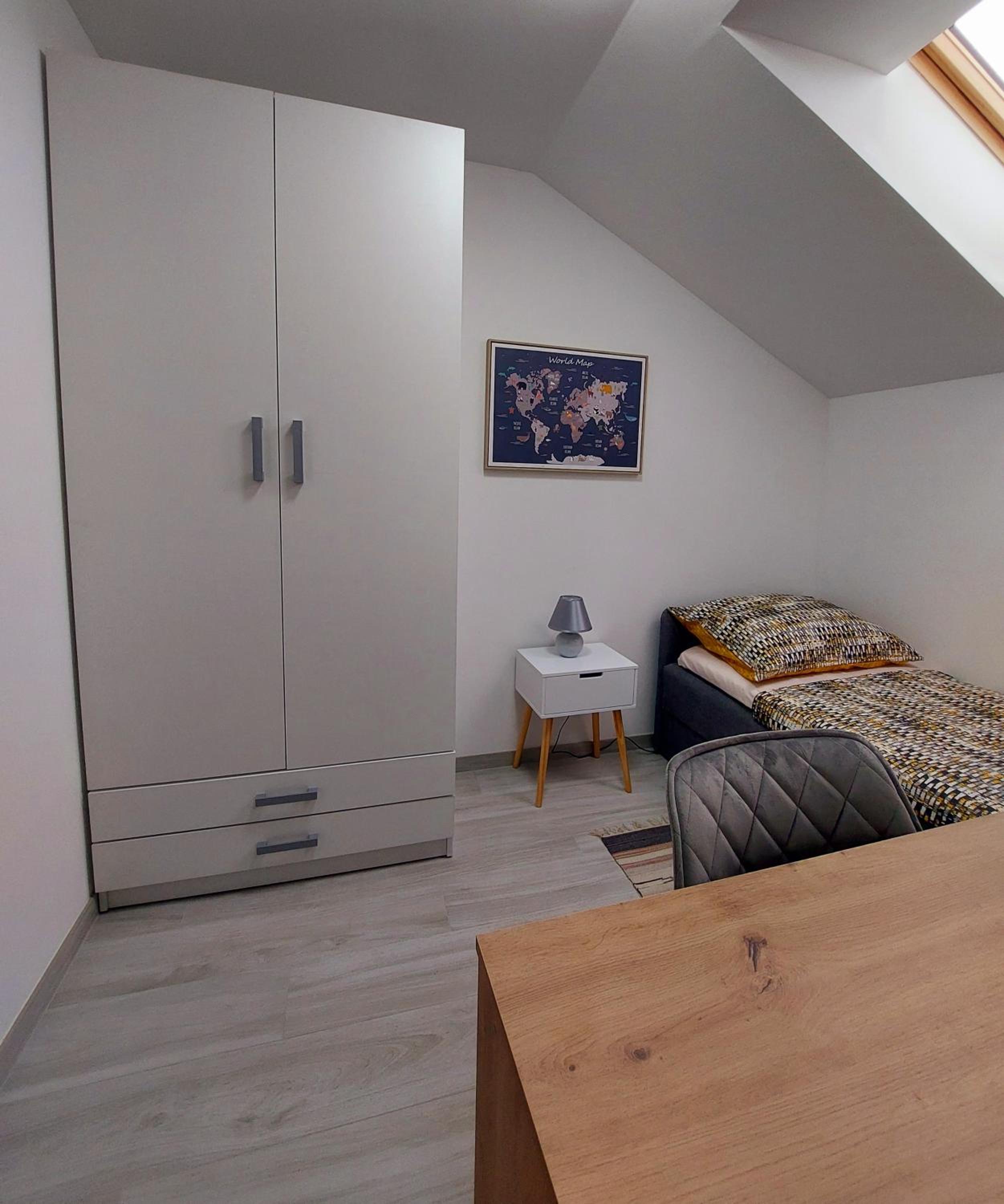 Three-Bedroom Apartment - Photo 32