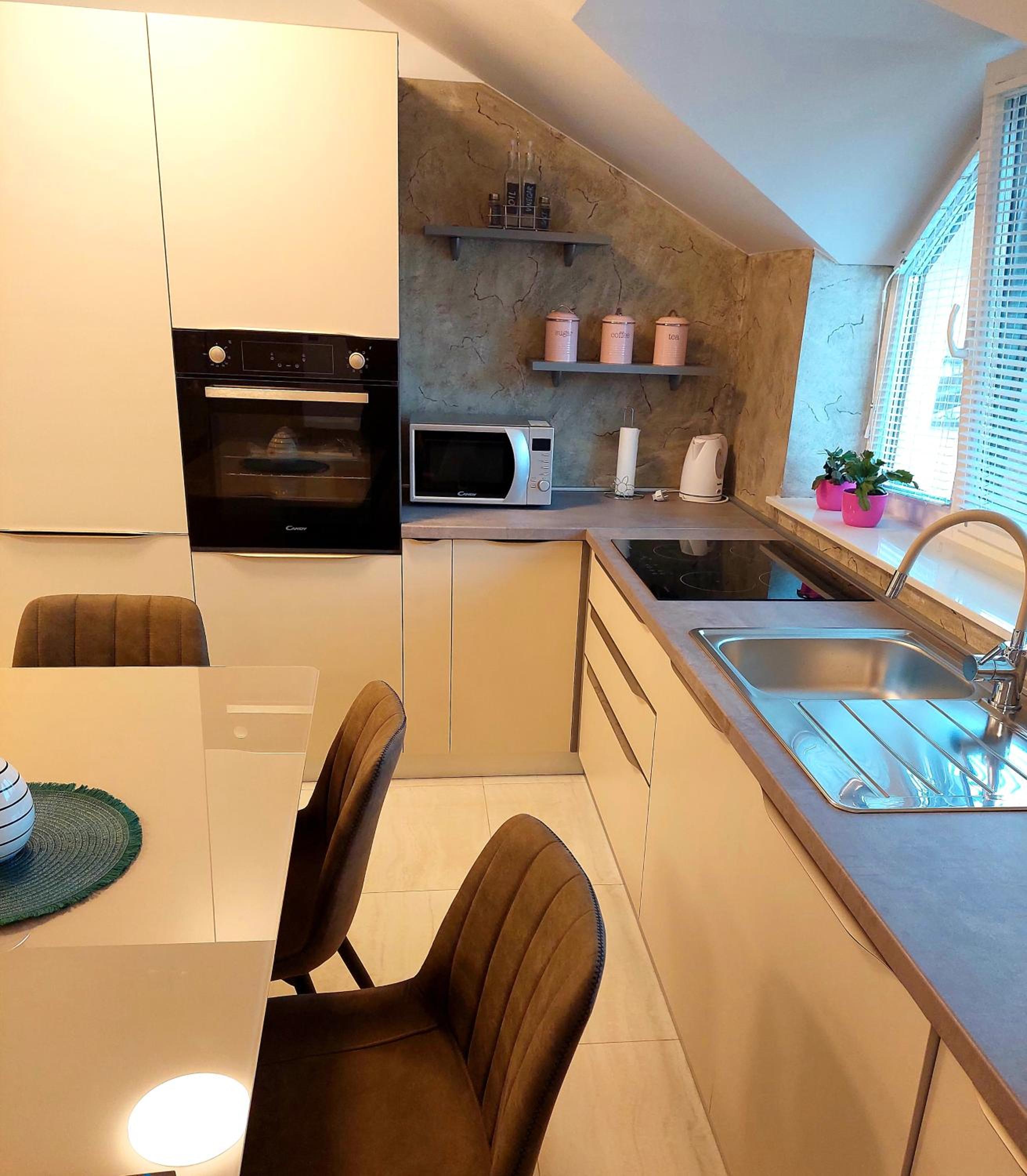 Three-Bedroom Apartment - Photo 29
