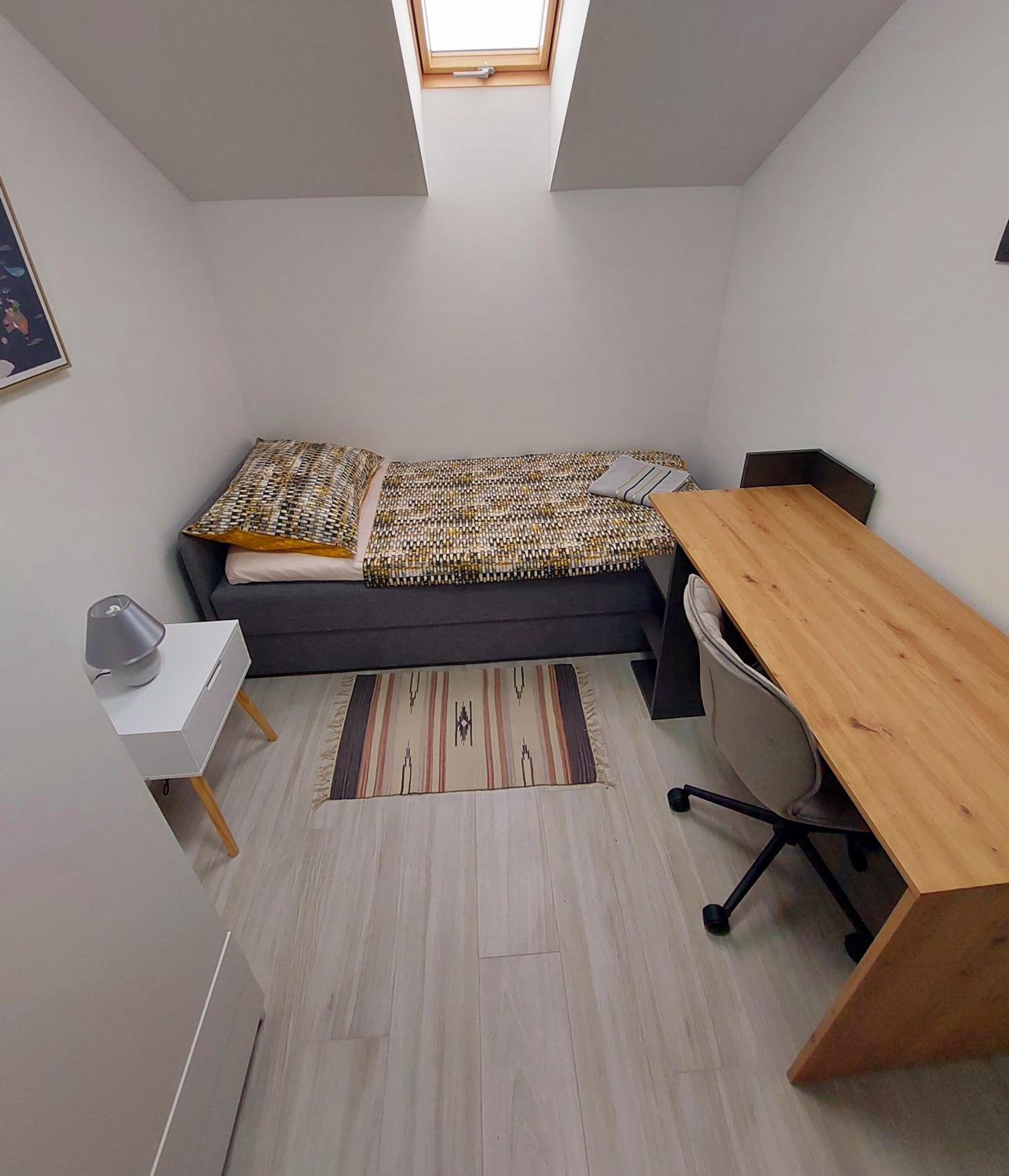 Three-Bedroom Apartment - Photo 28