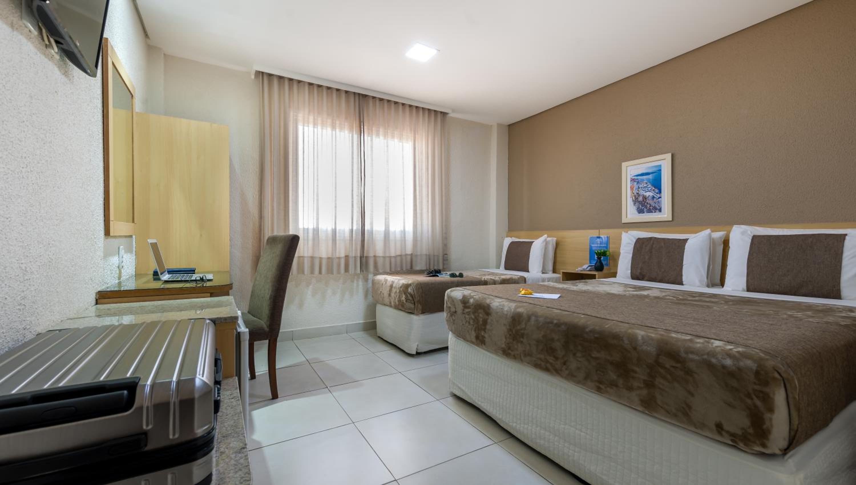 Standard Triple Room (1 Double + 1 Single Bed) photo 2