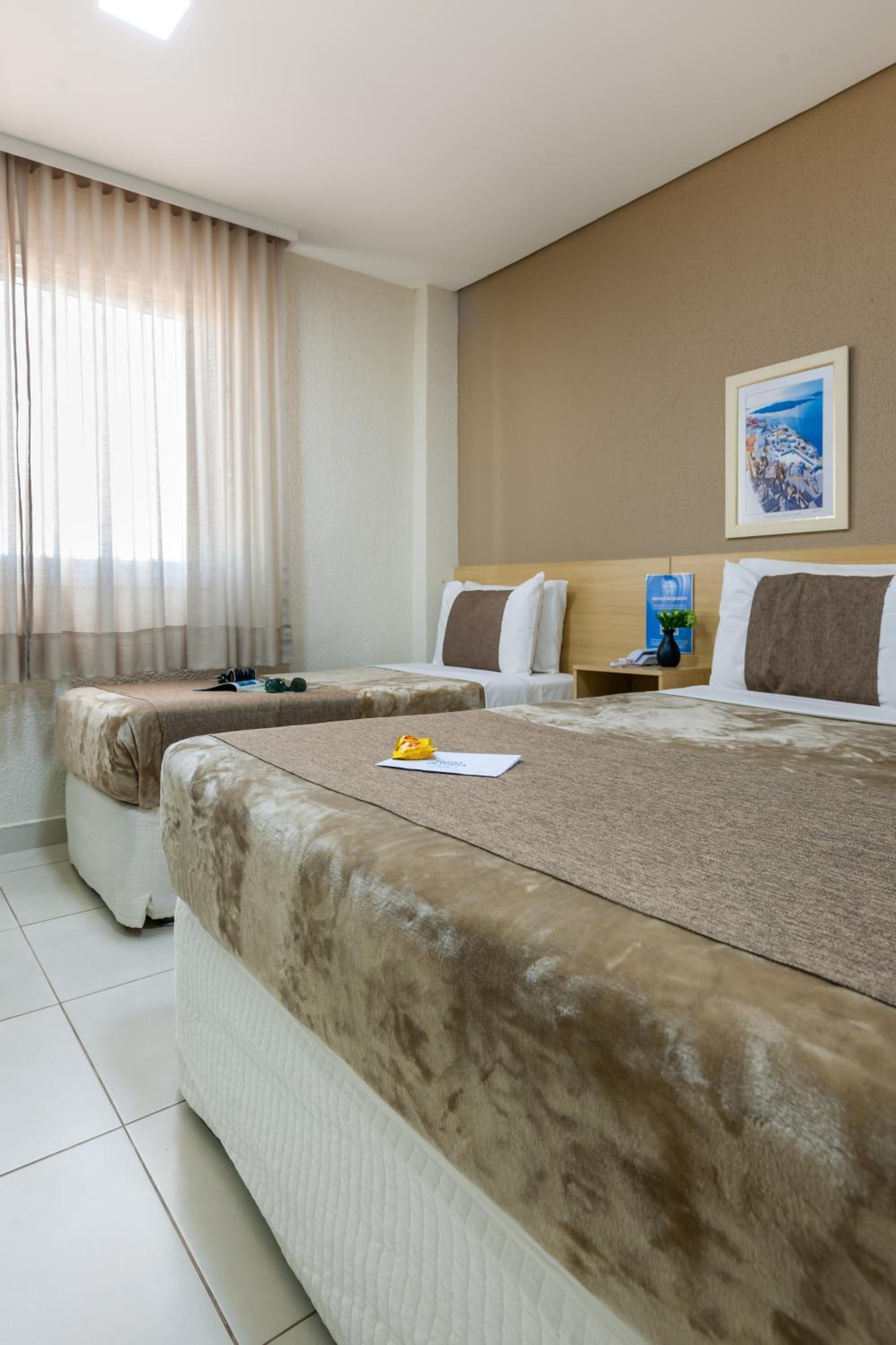 Standard Triple Room (1 Double + 1 Single Bed)