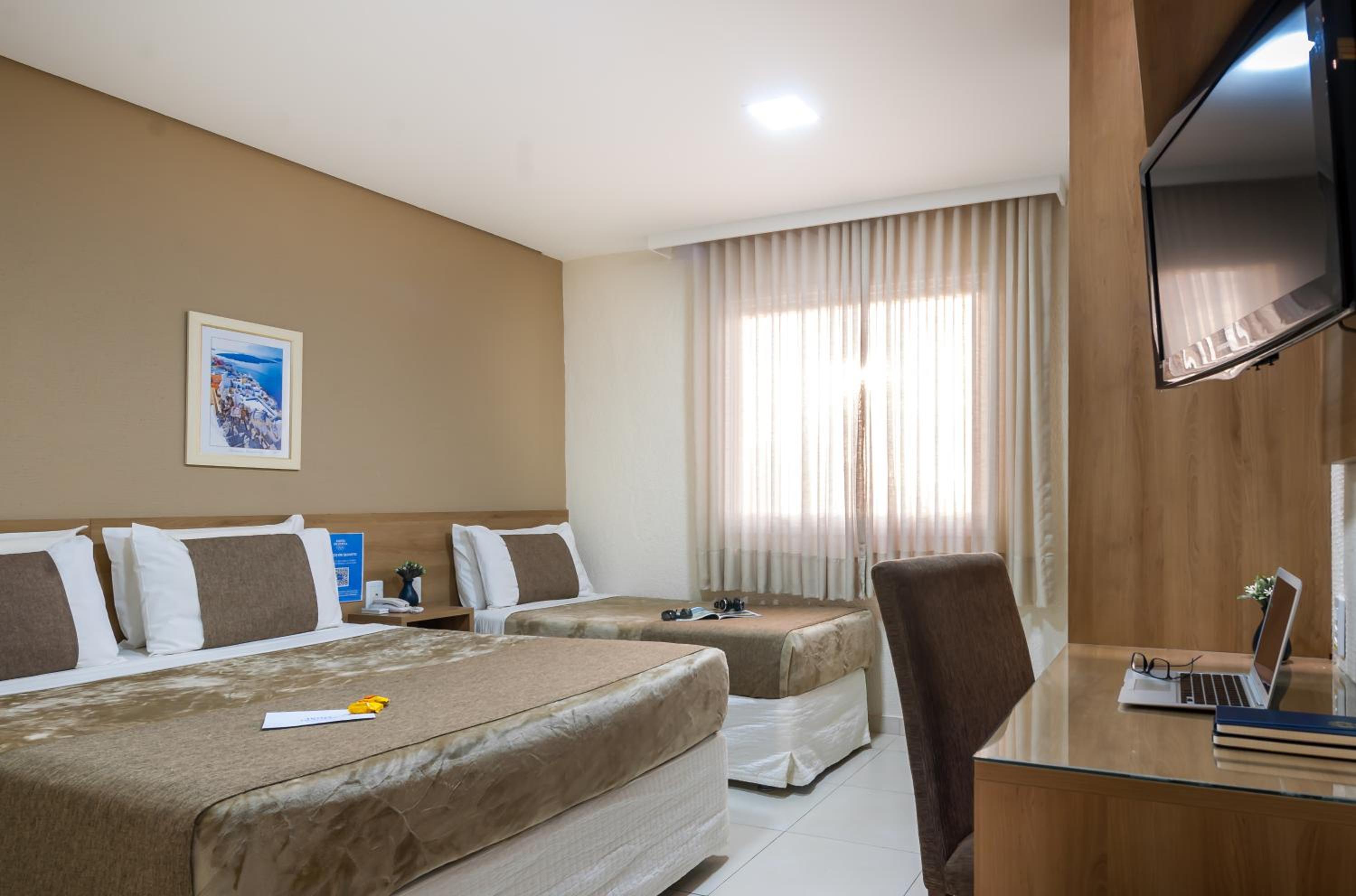 Deluxe Triple Room (1 Double + 1 Single Bed)