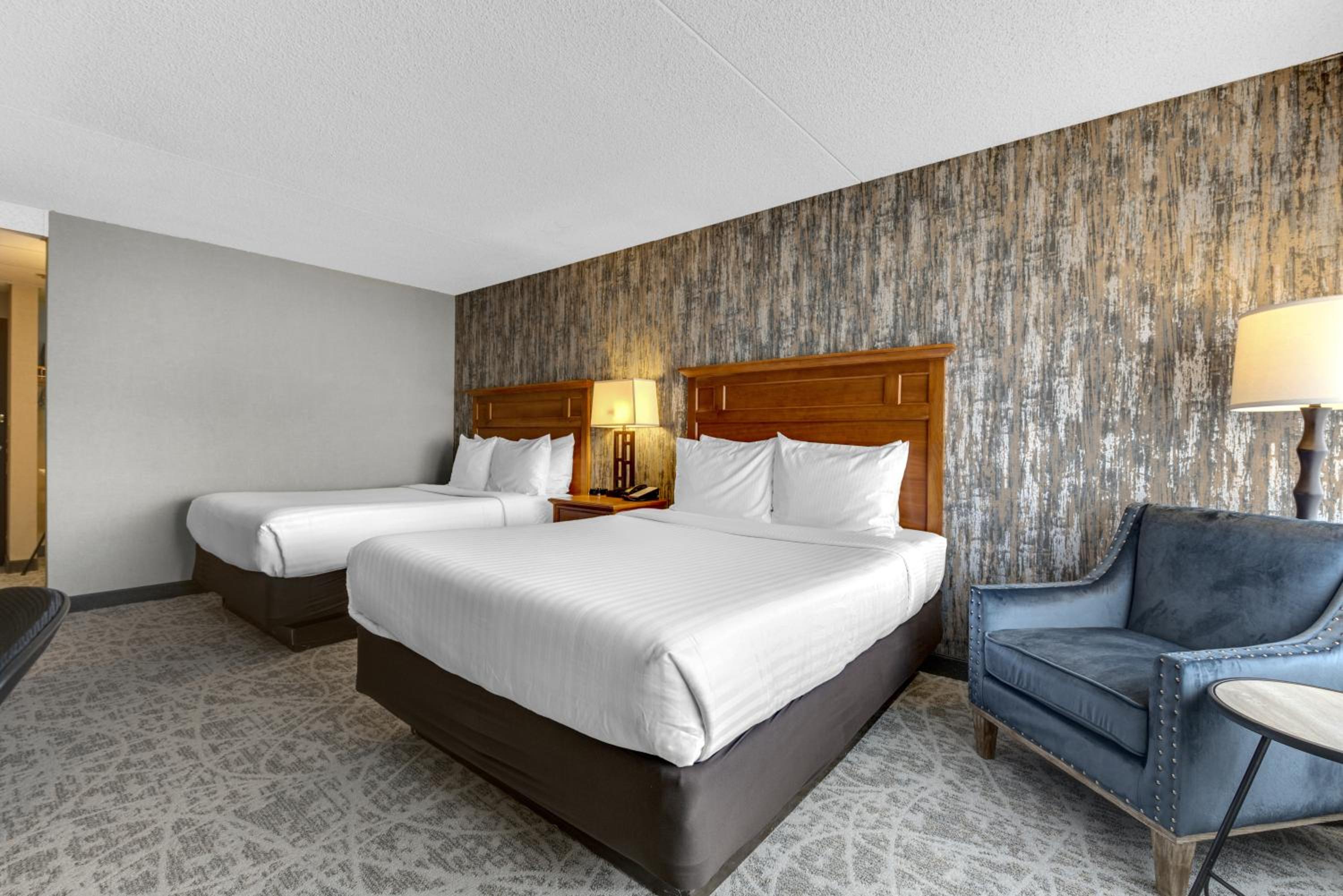 Deluxe Queen Room with Two Queen Beds - No pets - Photo 1