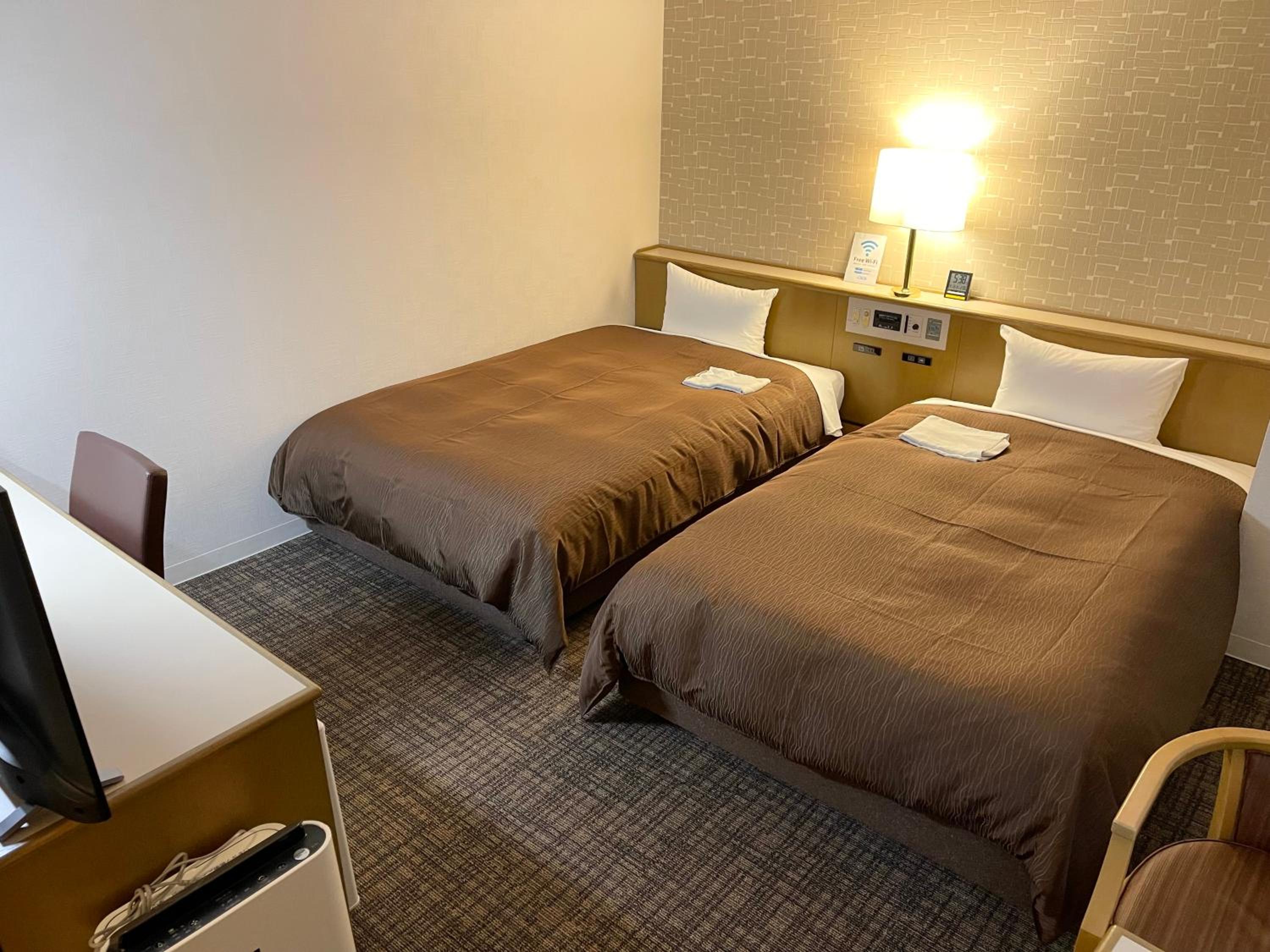 Twin Room with Extra Bed - Non-Smoking - Photo 11