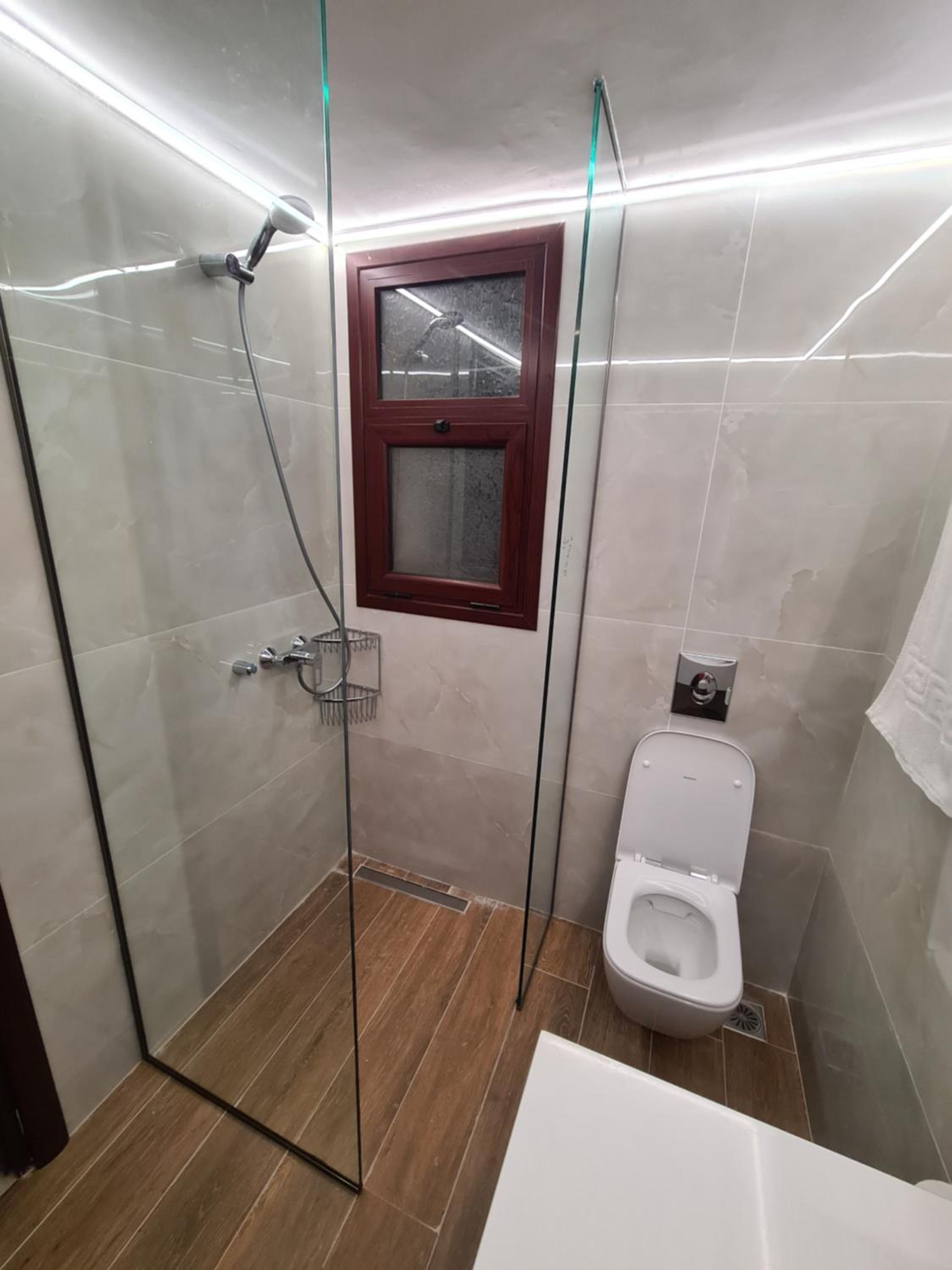 Three-Bedroom House - Photo 36