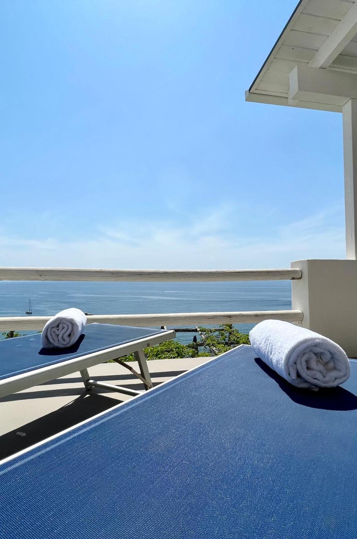 Deluxe Triple Room with Terrace and Sea View - Photo 20