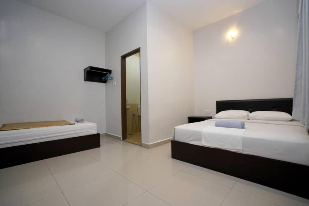 Deluxe Triple Room - Photo 1