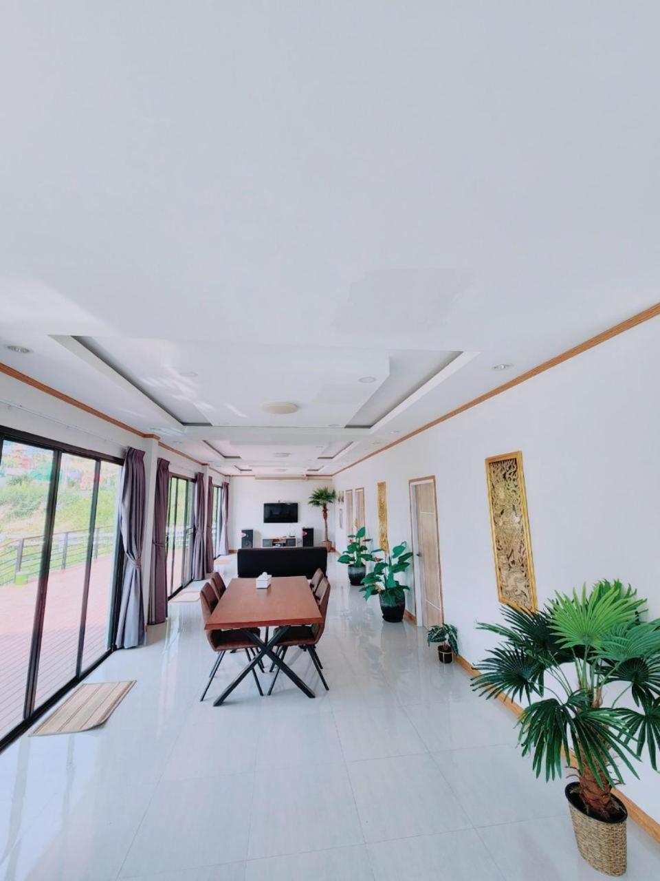 Three-Bedroom House - Photo 7