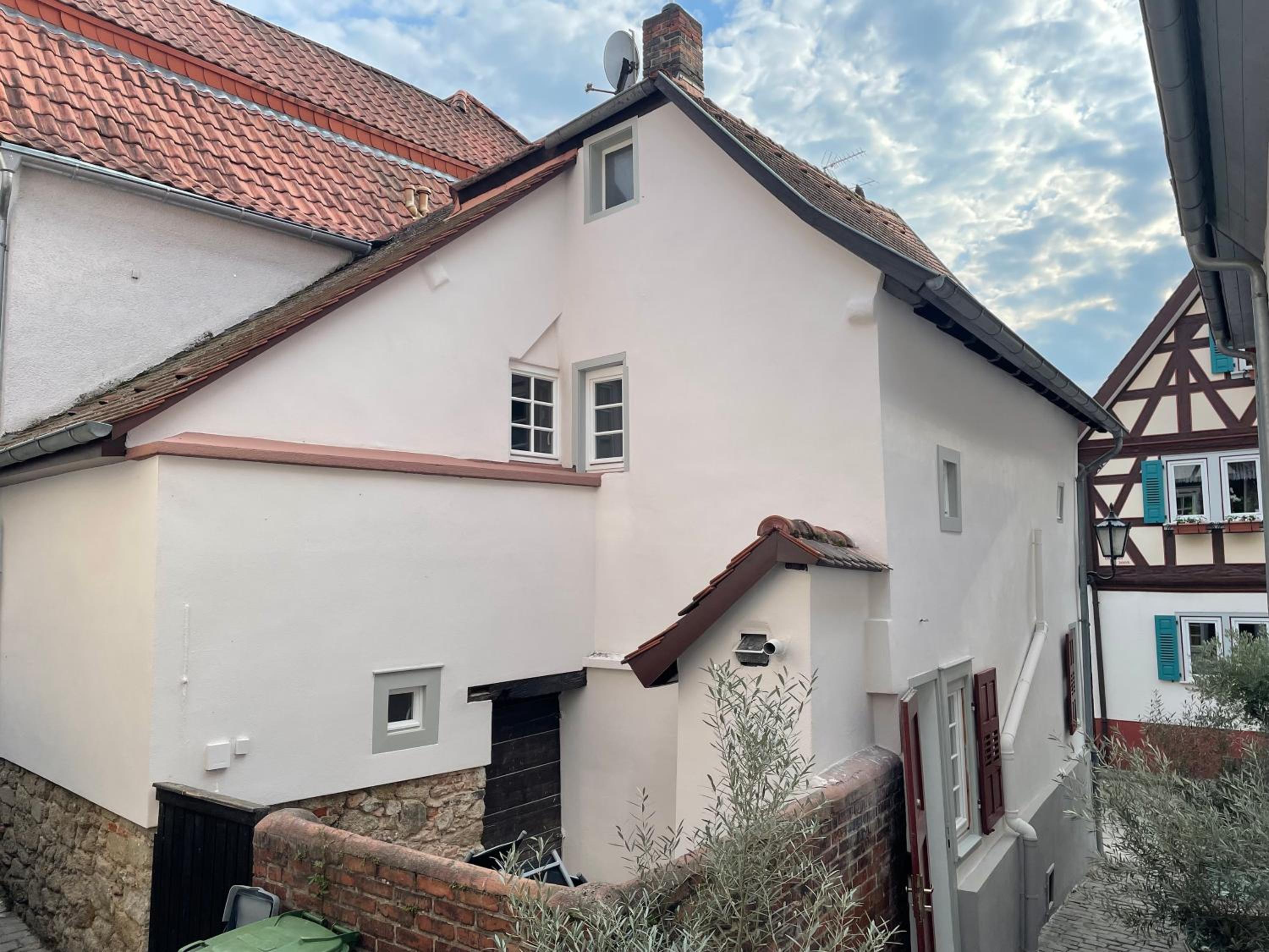 Three-Bedroom House - Photo 23
