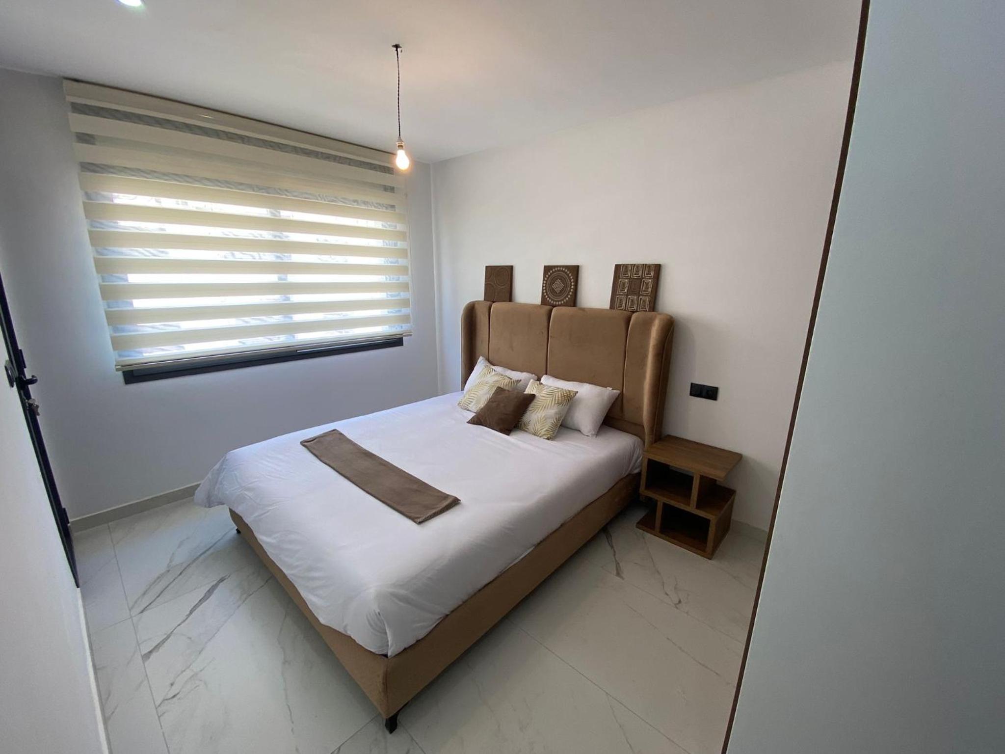 Three-Bedroom Apartment - Photo 16