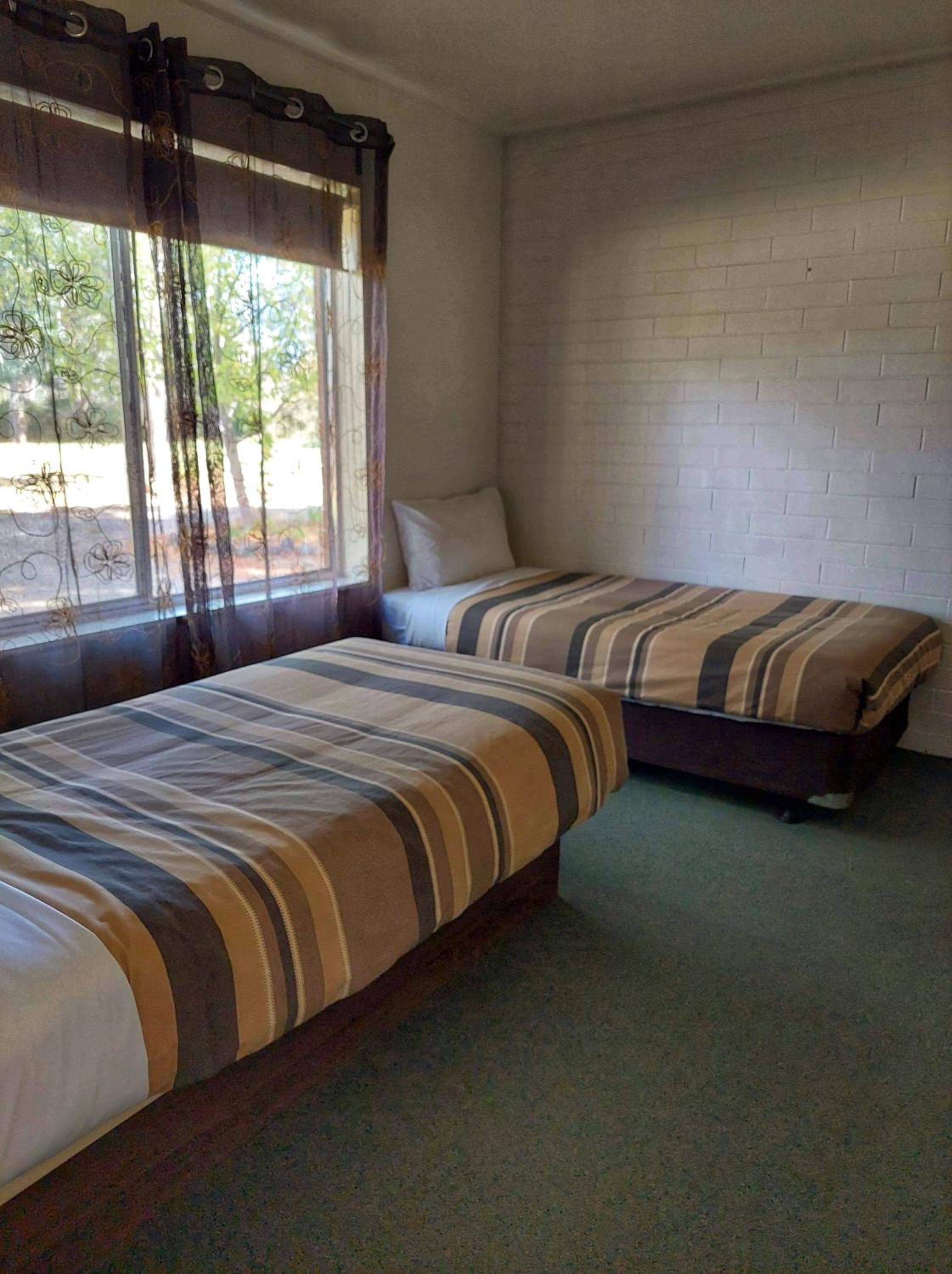 Two Bedroom Apartment - Queen and Two Single Beds photo 1
