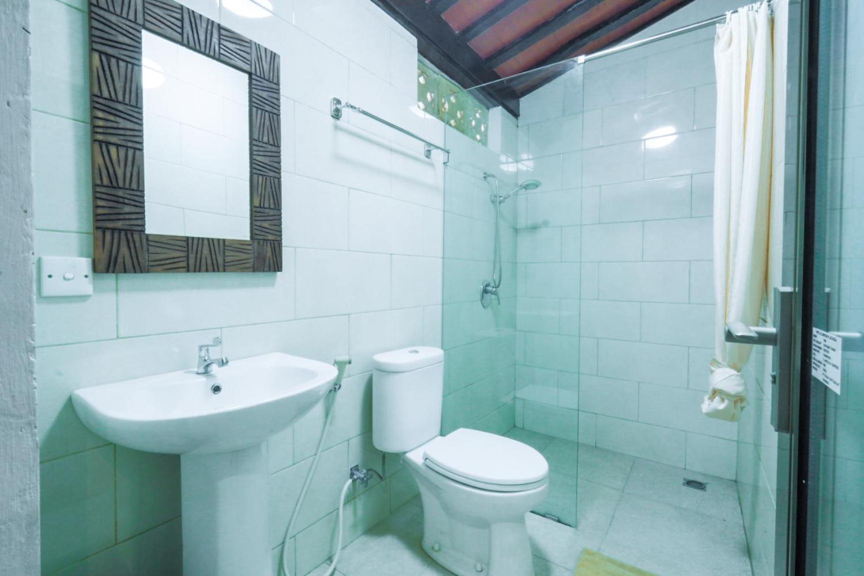 Deluxe Triple Room - Photo 11
