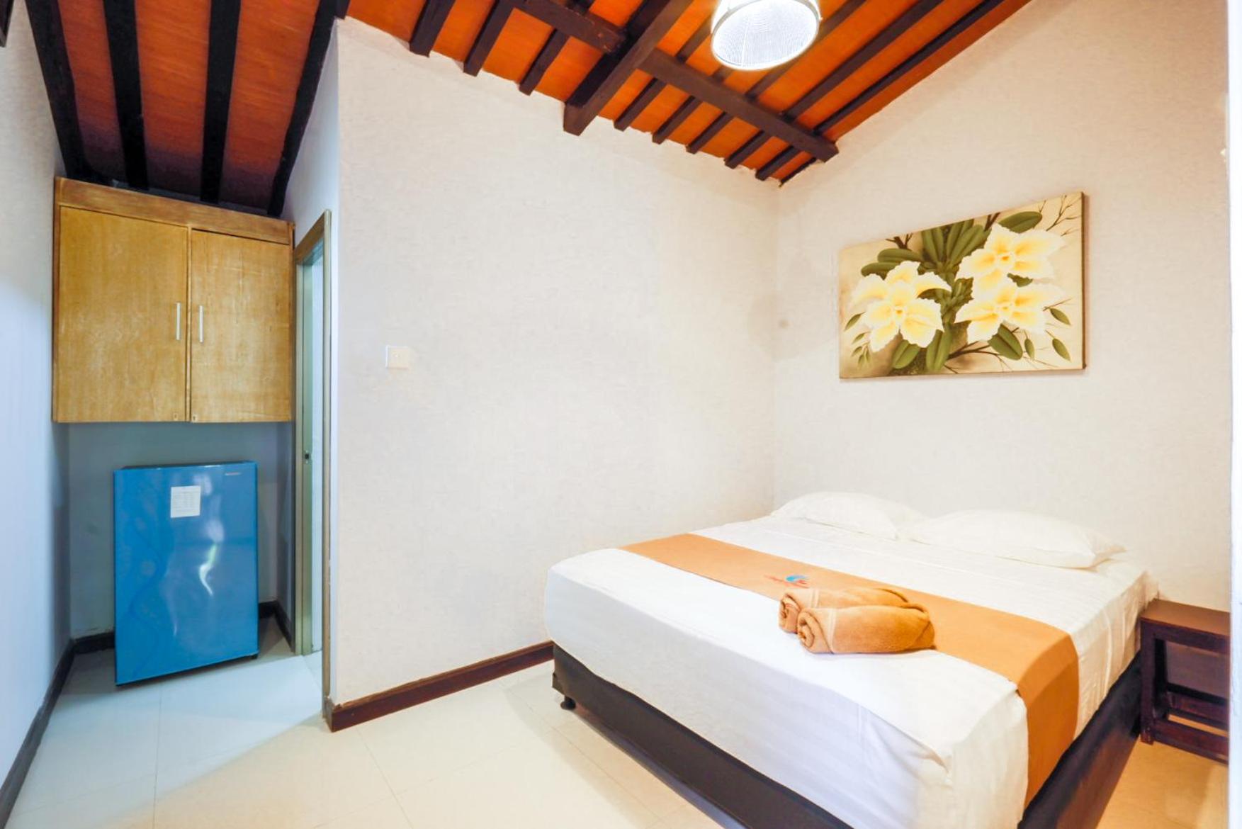 Deluxe Triple Room - Photo 13