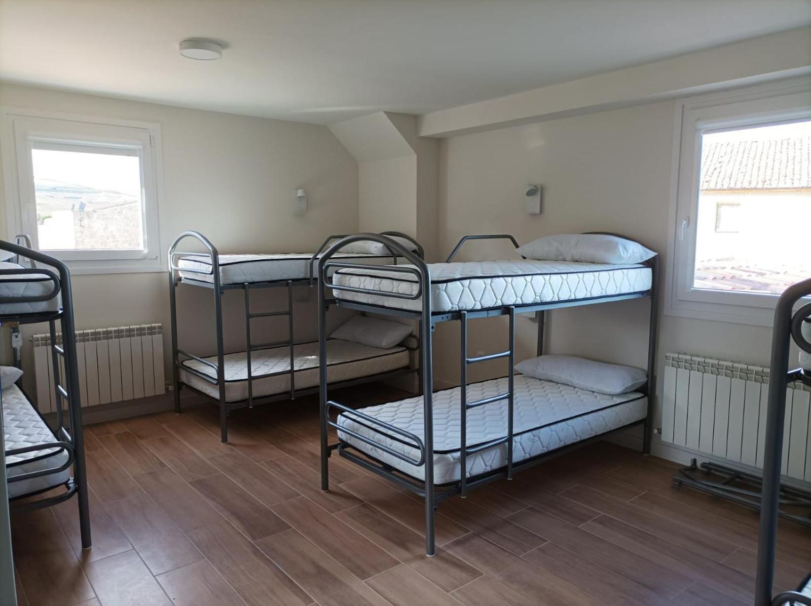 Cama individual en habitación compartida