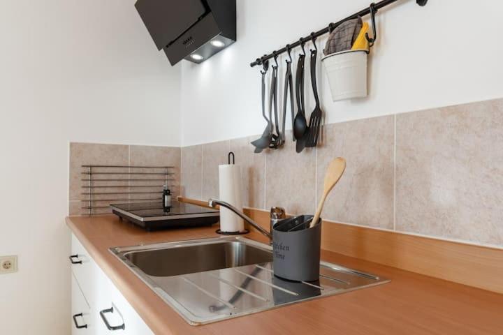 Three-Bedroom Apartment - Photo 31