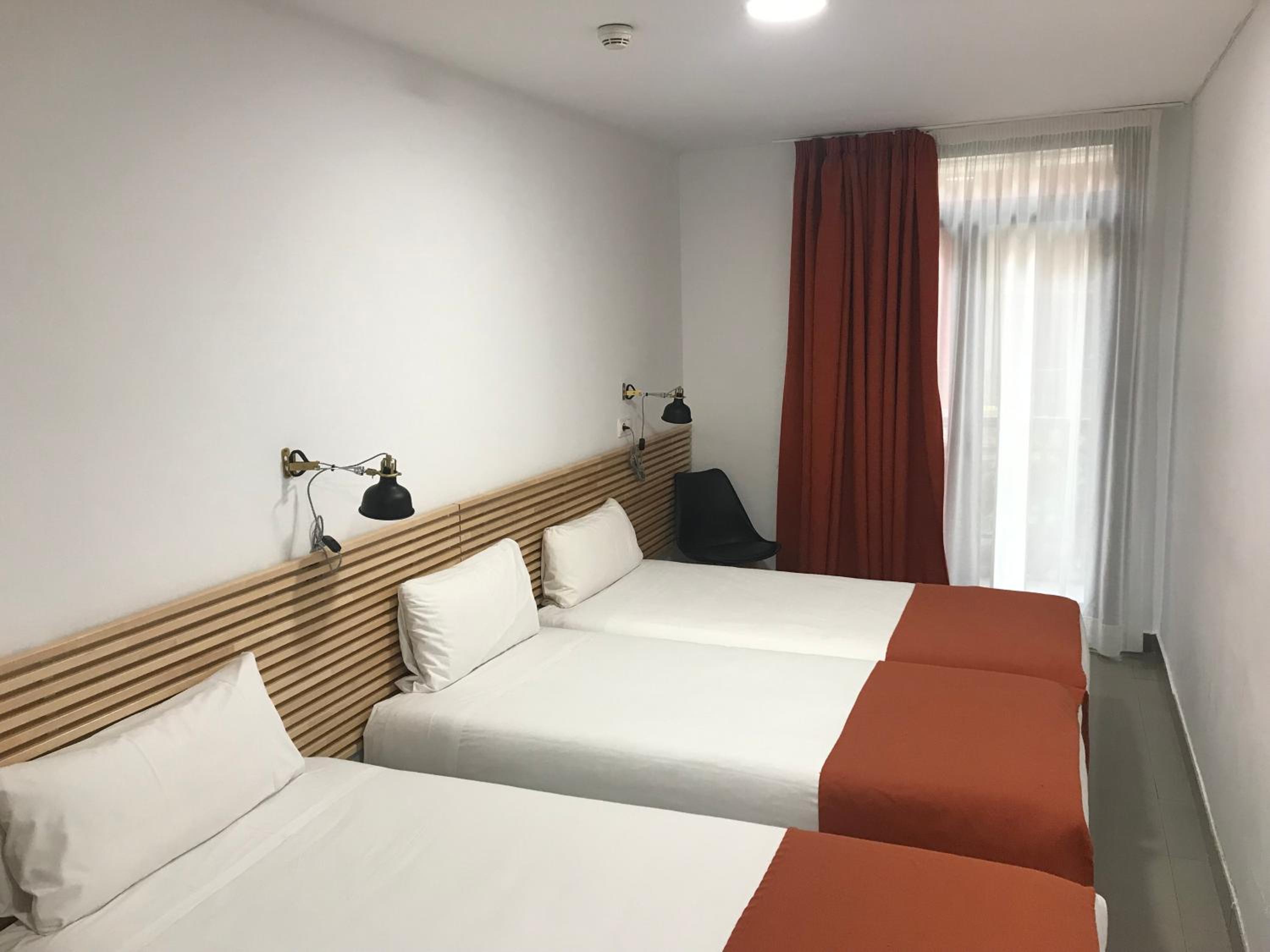 Habitación Triple con Balcón