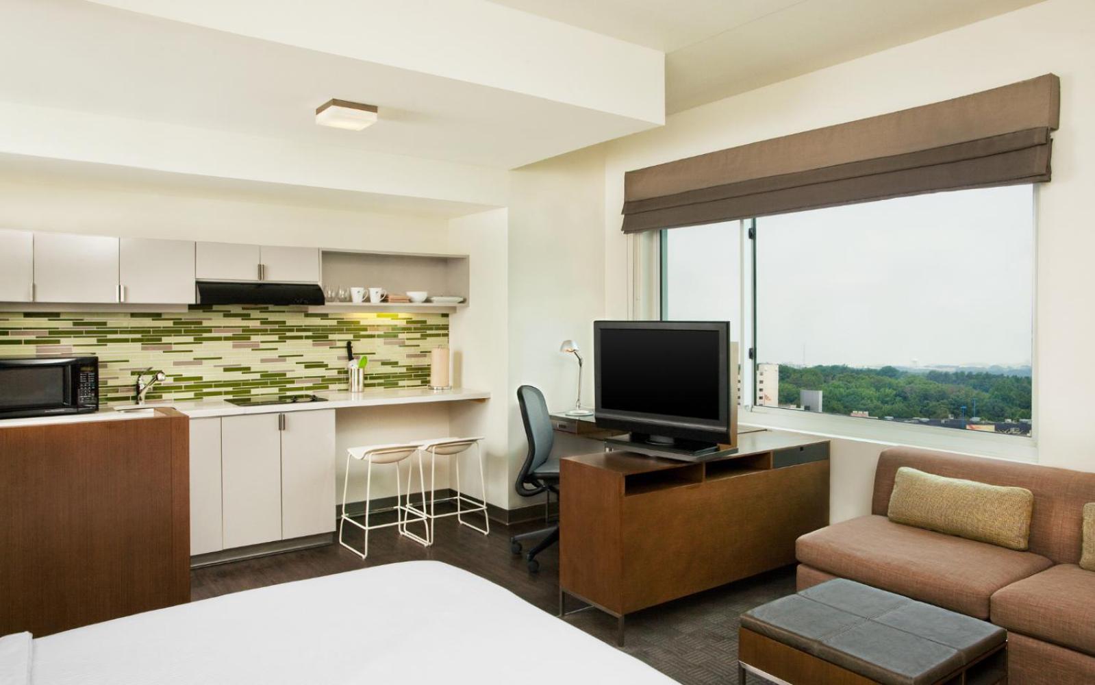 Studio King Suite with Full Kitchen - Mobility/Hearing Accessible with Roll-In Shower