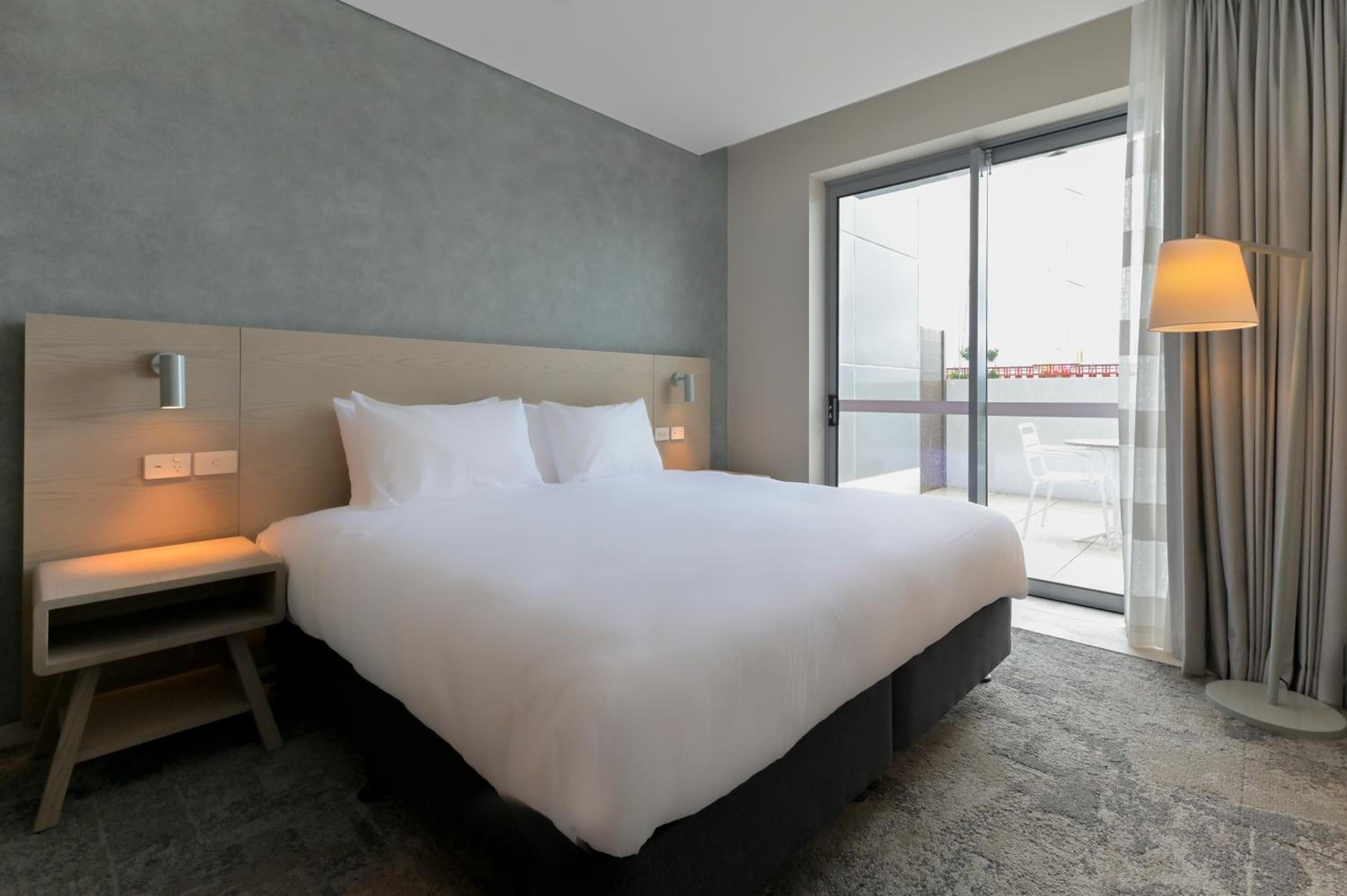 Standard King Room with Patio - Photo 1