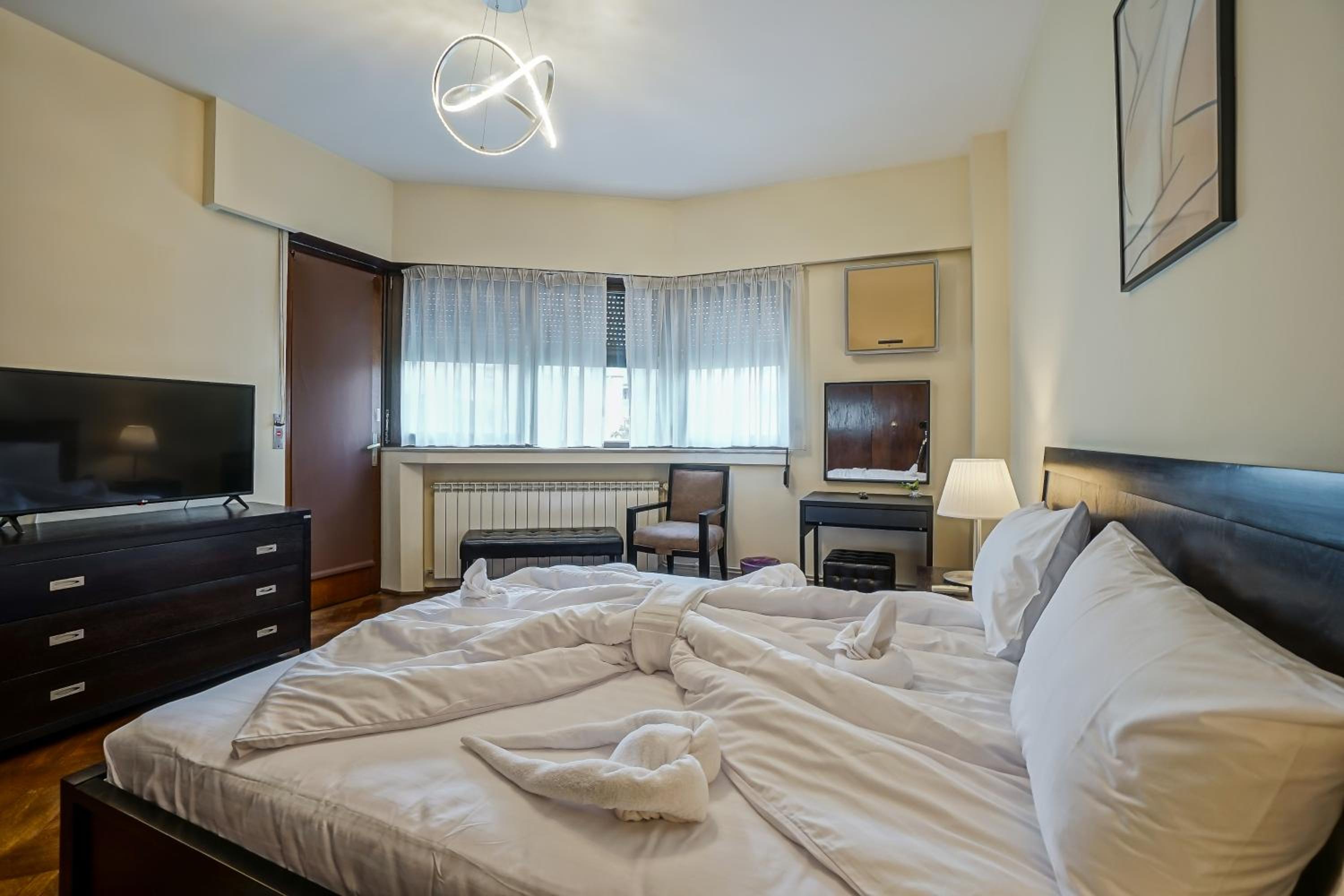 Three-Bedroom Apartment - Photo 11