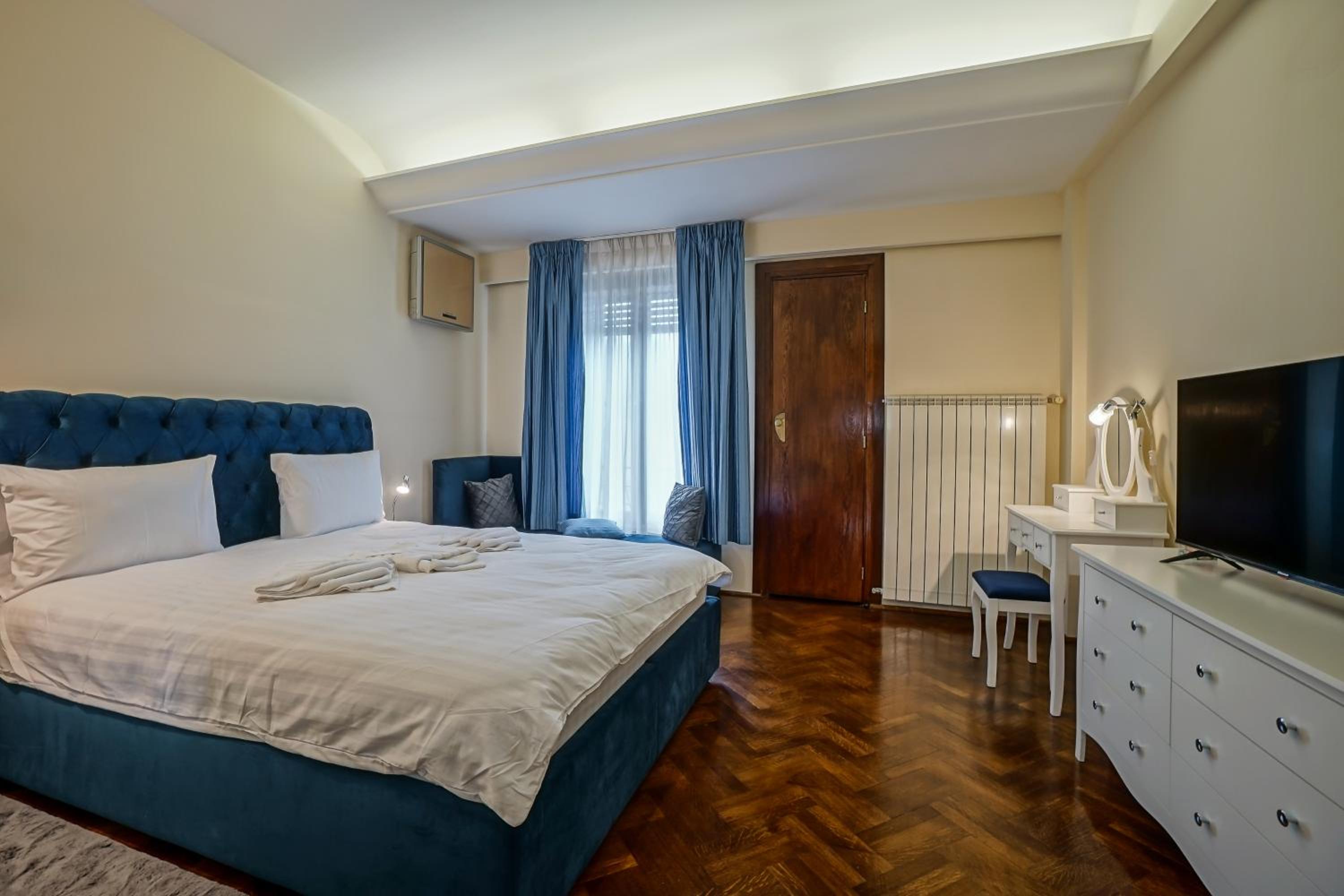 Three-Bedroom Apartment - Photo 16