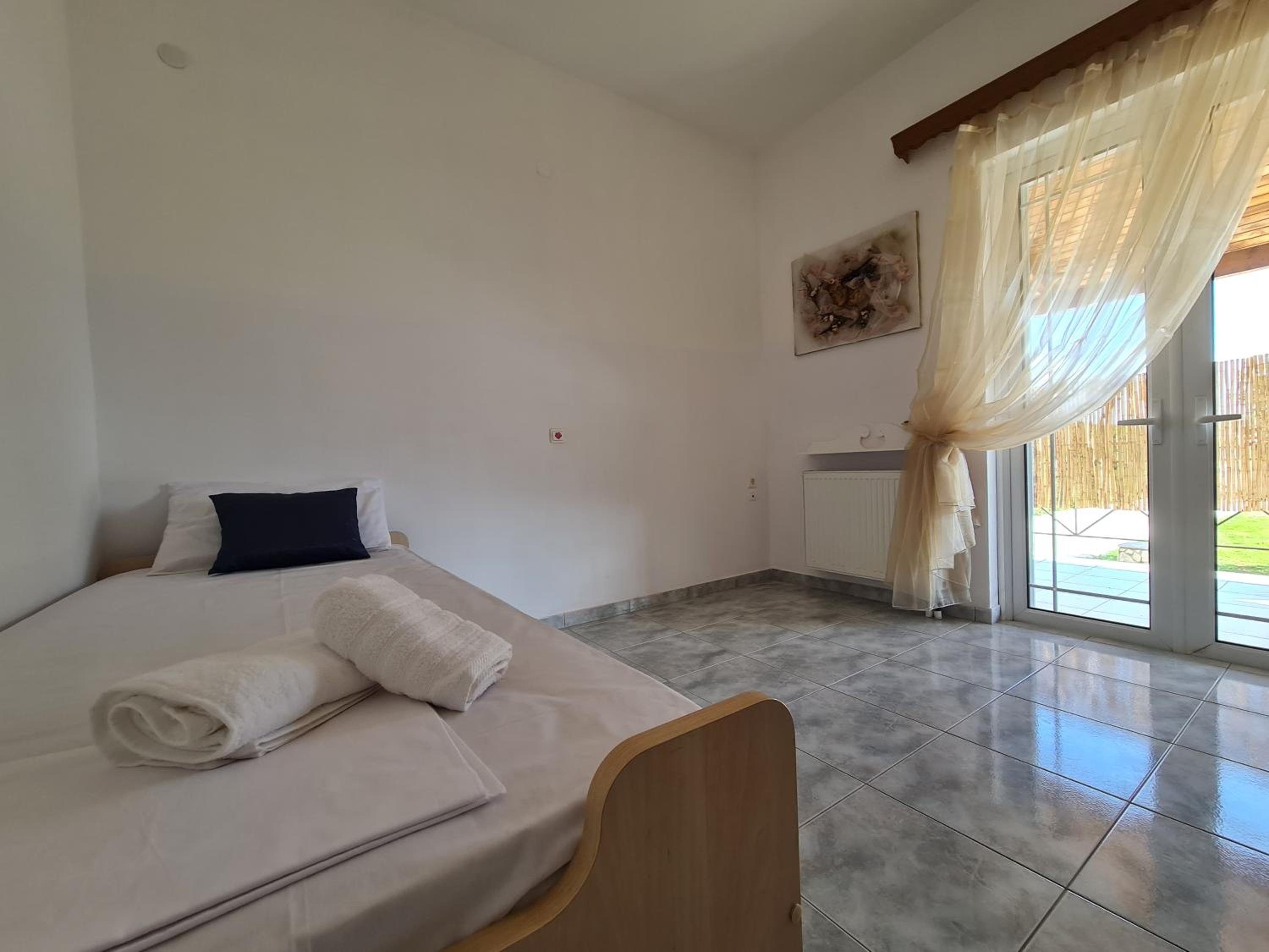 Three-Bedroom Apartment - Photo 17