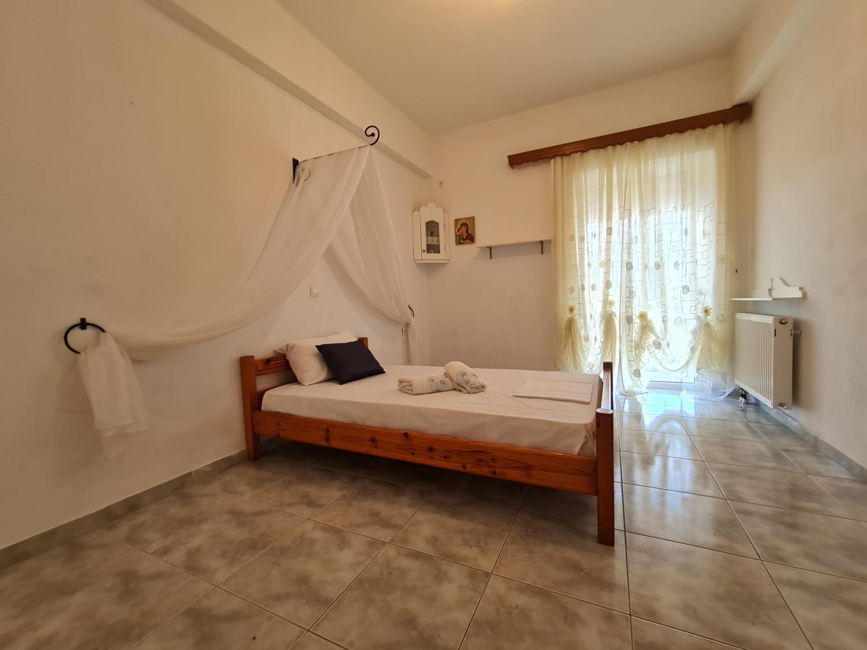Three-Bedroom Apartment - Photo 40