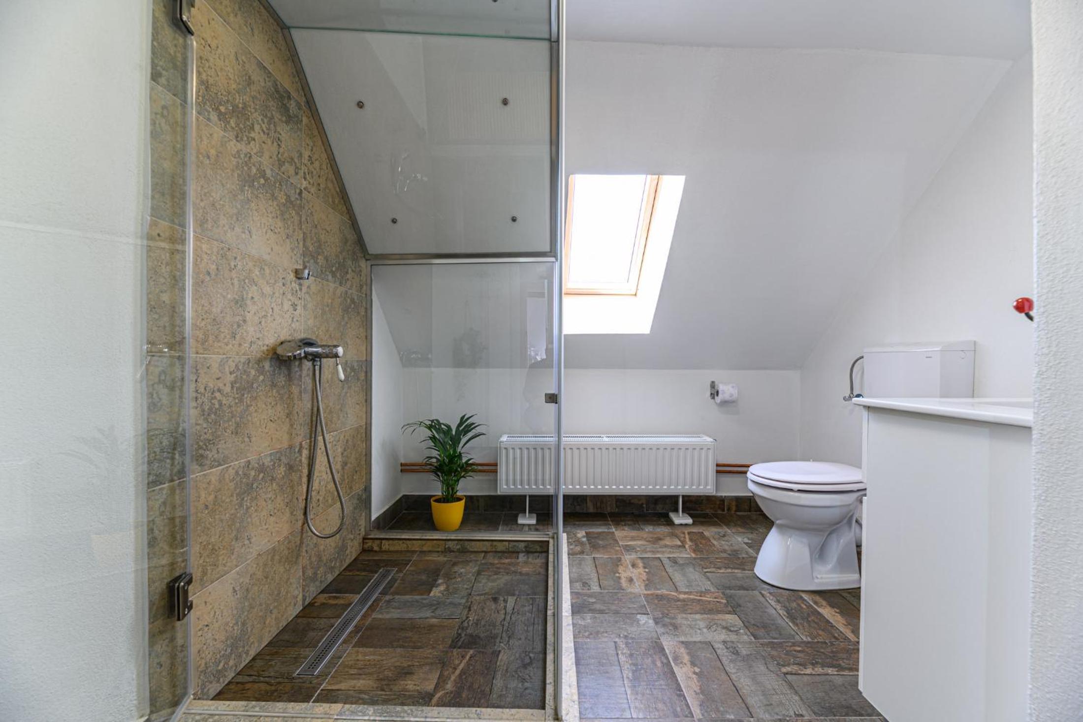 Three-Bedroom Apartment - Photo 12