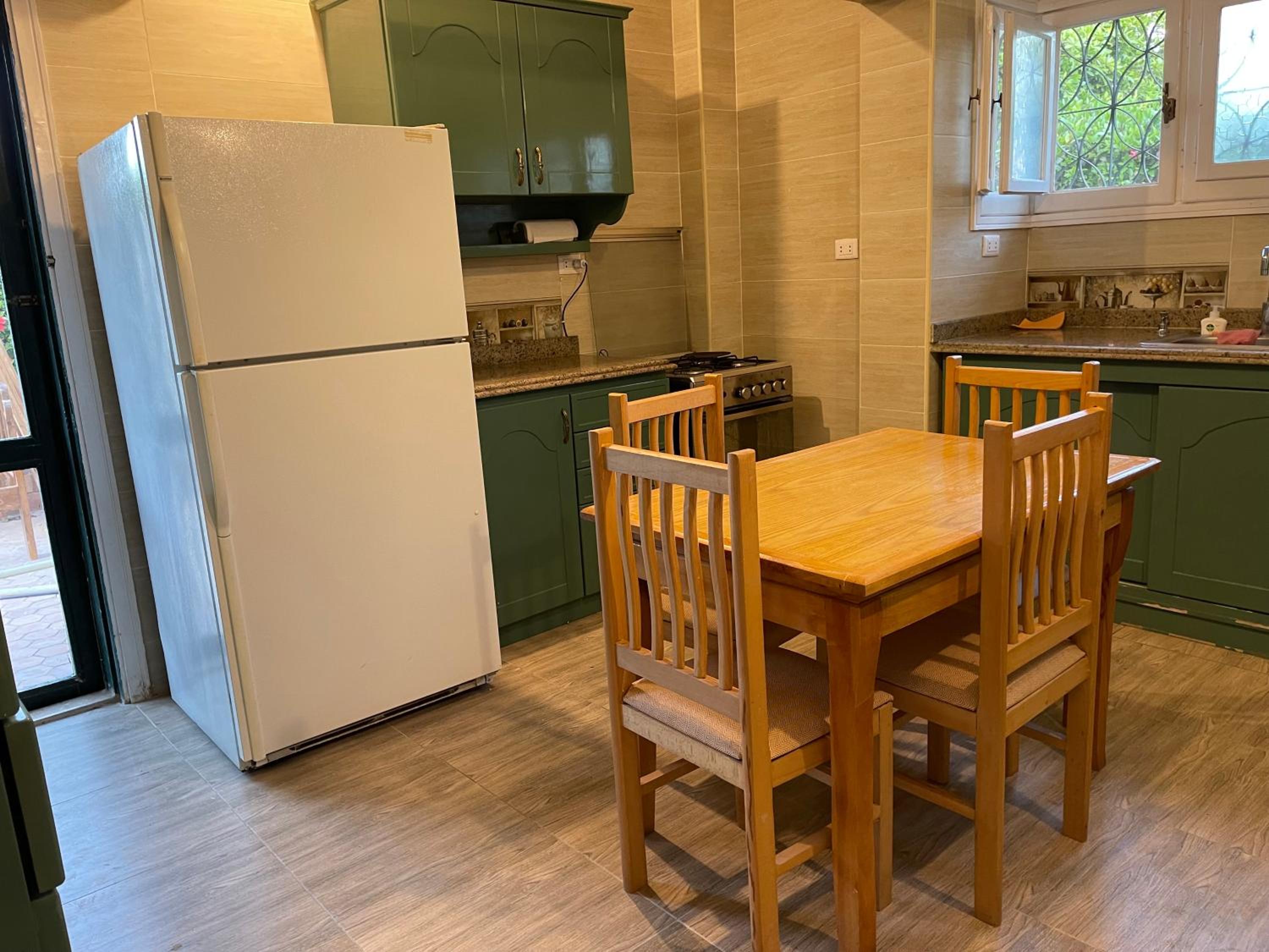 Three-Bedroom House - Photo 27