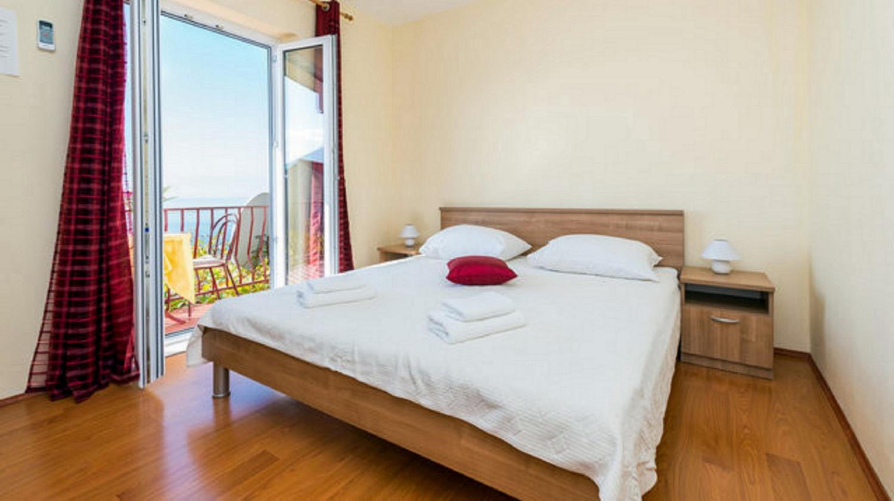 One-Bedroom Apartment with Balcony and Sea View