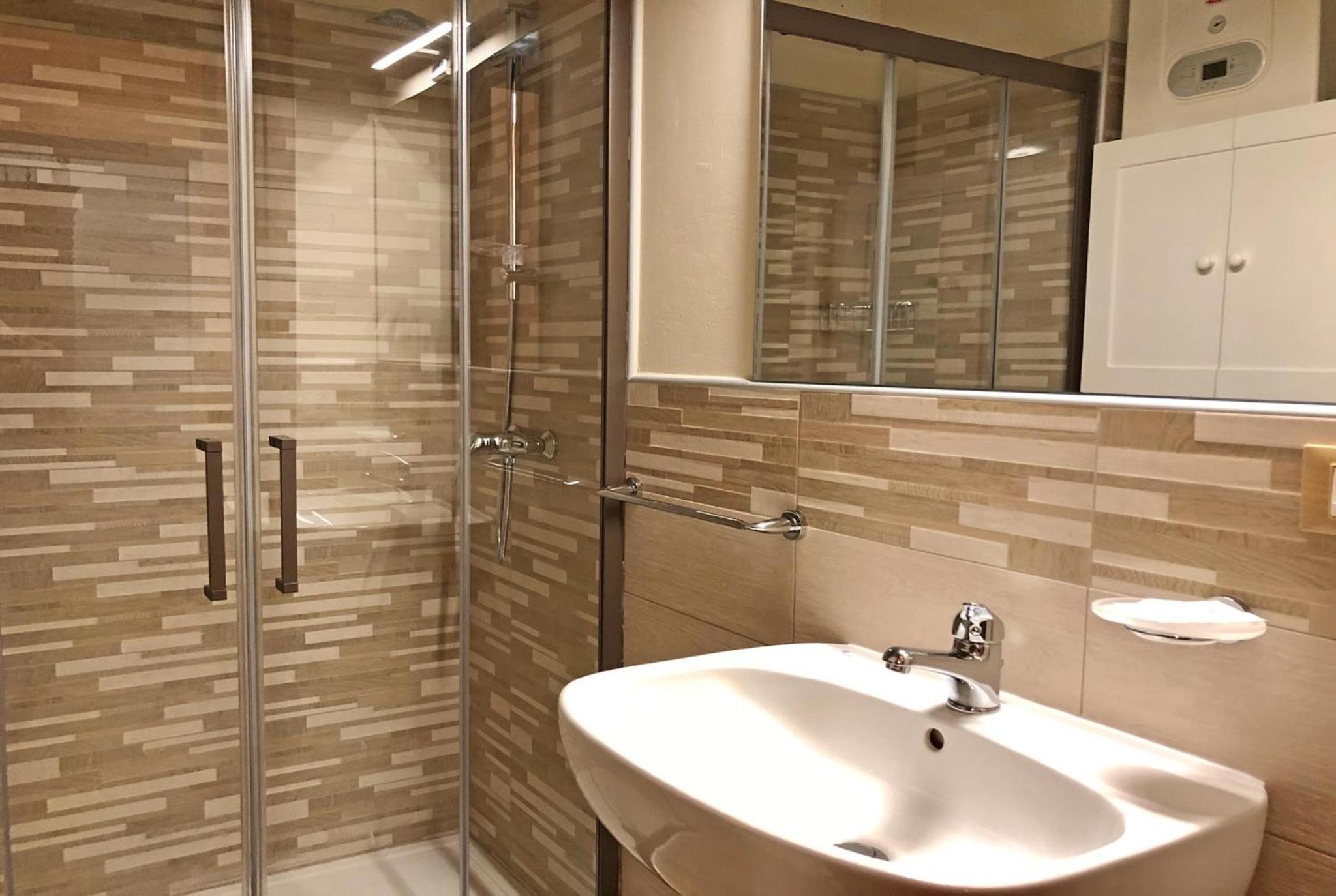 Three-Bedroom Apartment - Photo 2