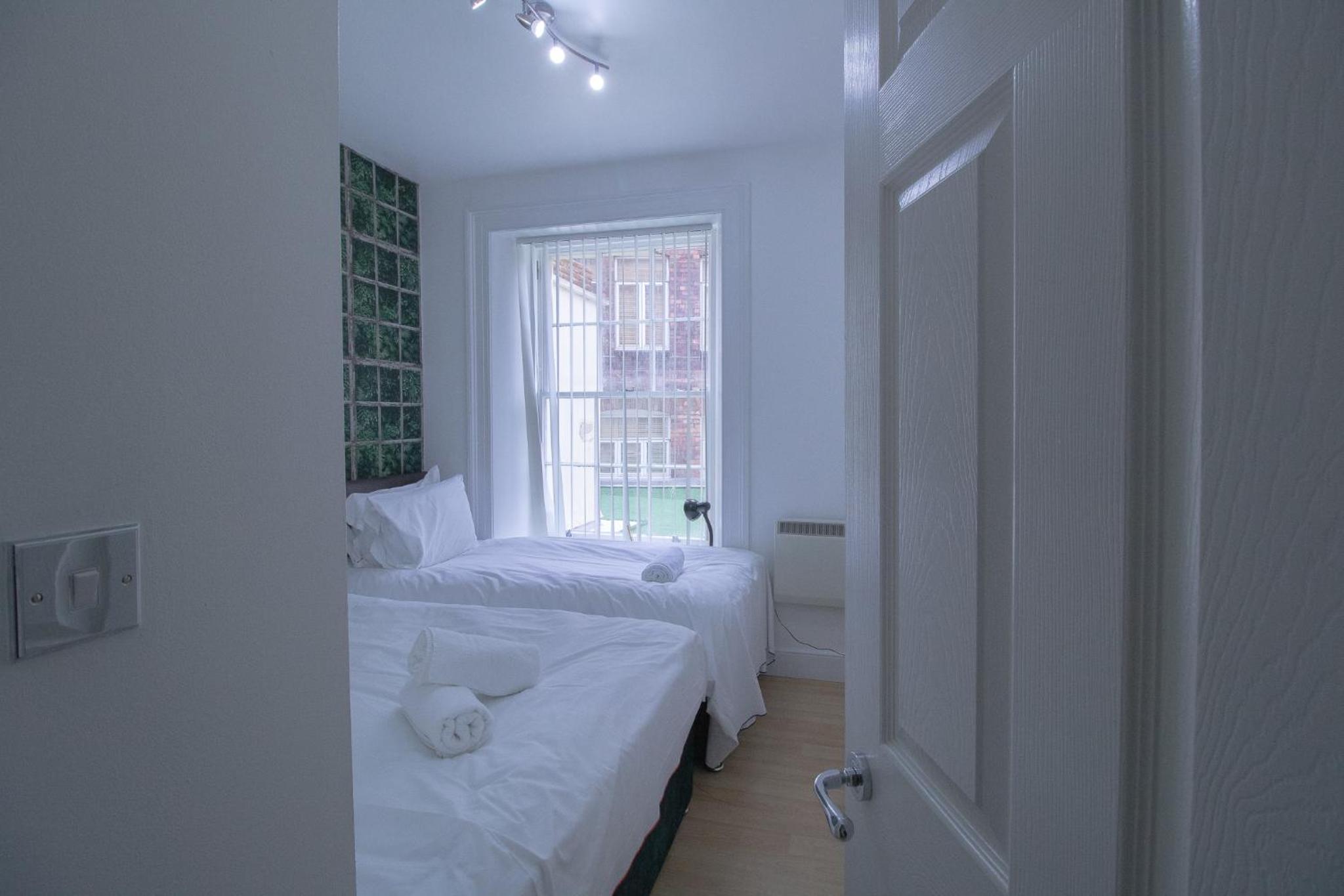 Two-Bedroom Apartment - Photo 11