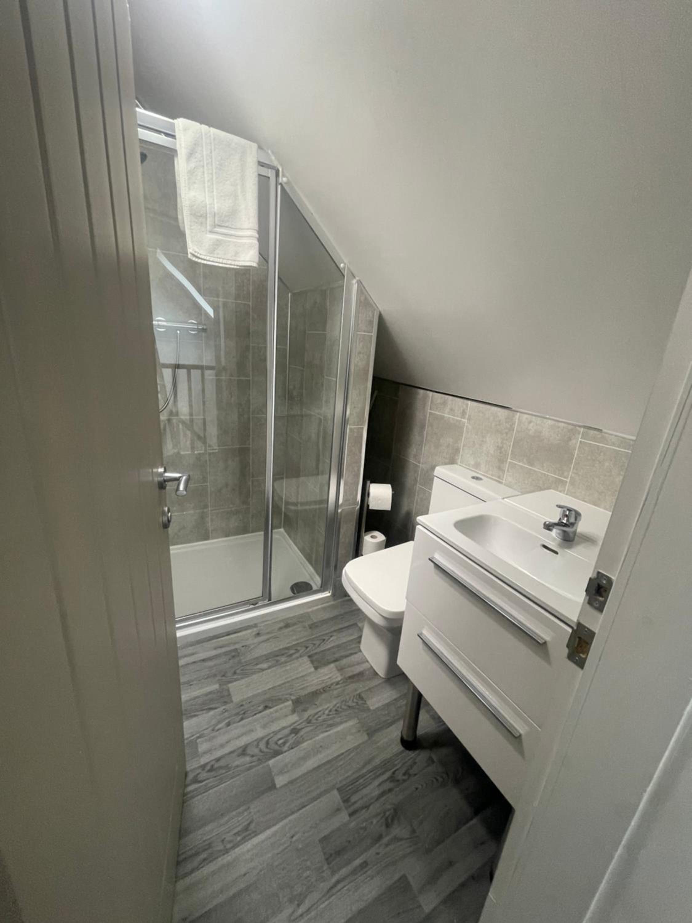 Three-Bedroom House - Photo 13