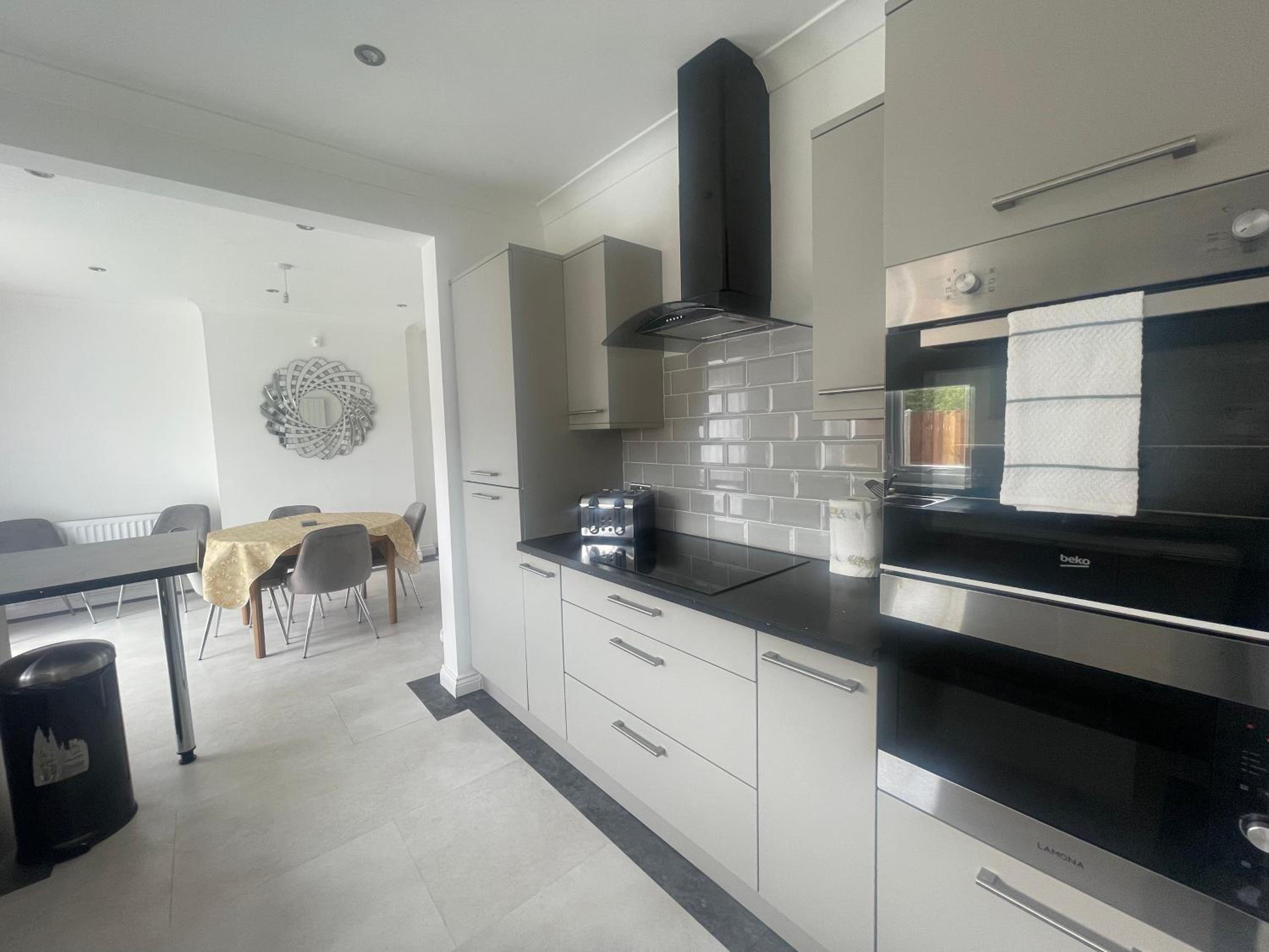 Three-Bedroom House - Photo 10