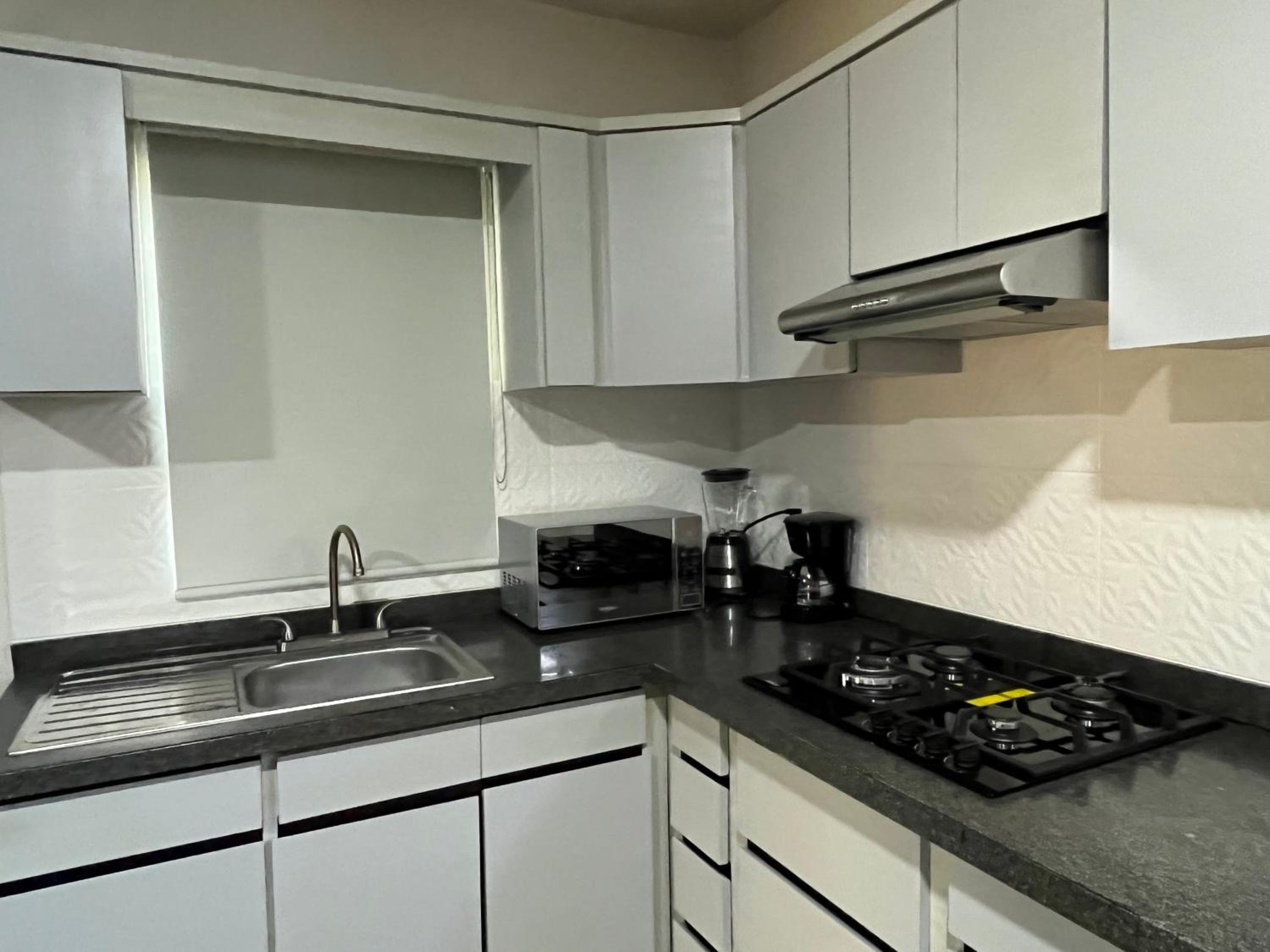 Two-Bedroom Apartment - Photo 16