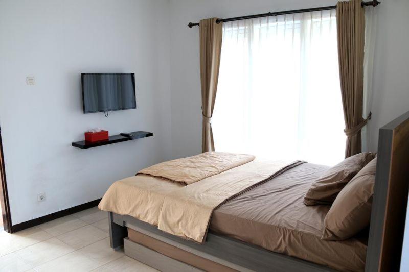 Deluxe Triple Room - Photo 7