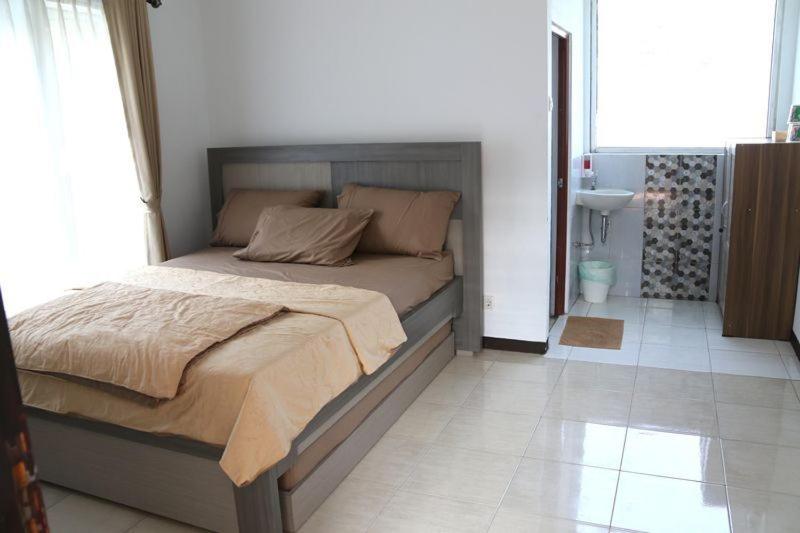 Deluxe Triple Room - Photo 8